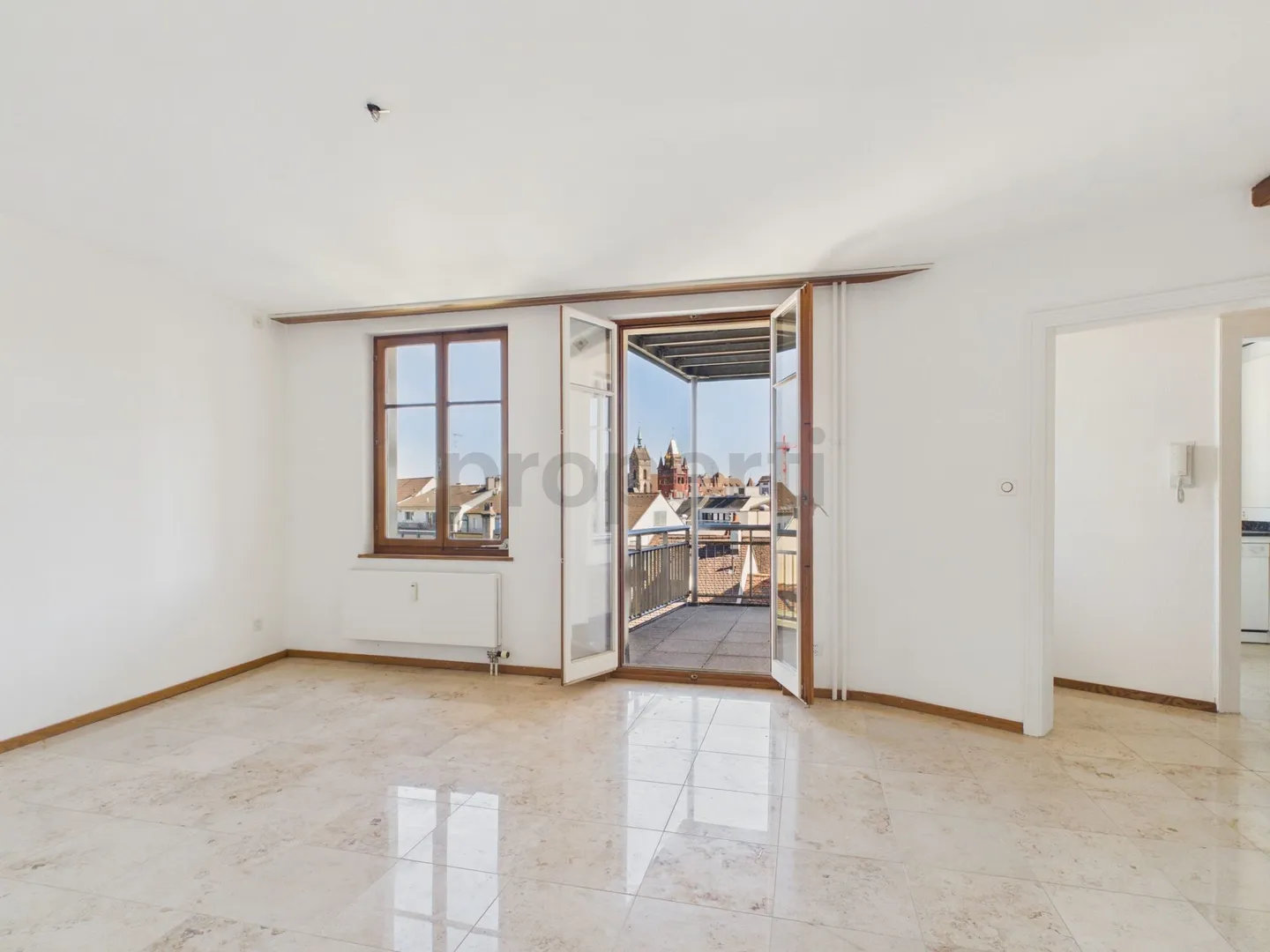 Charming Living with Balcony and Historic Flair - Photo 1 of 13
