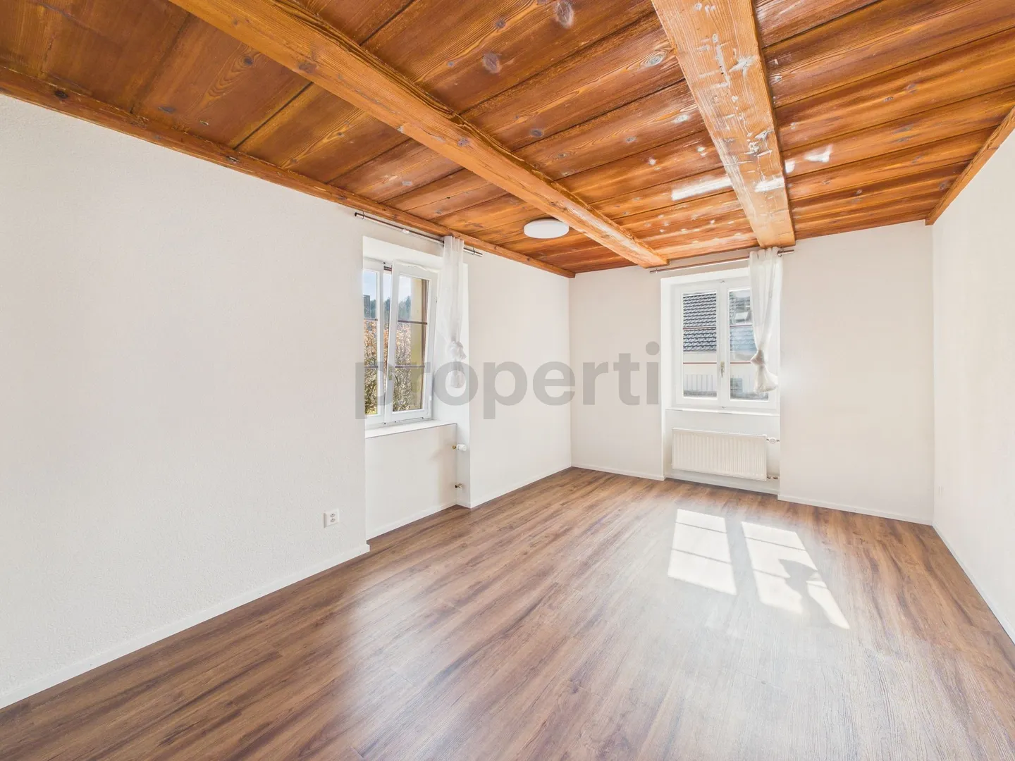 Idylle résidentielle avec jardin et véranda - Appartement 3.5 pièces - Photo 11 sur 13