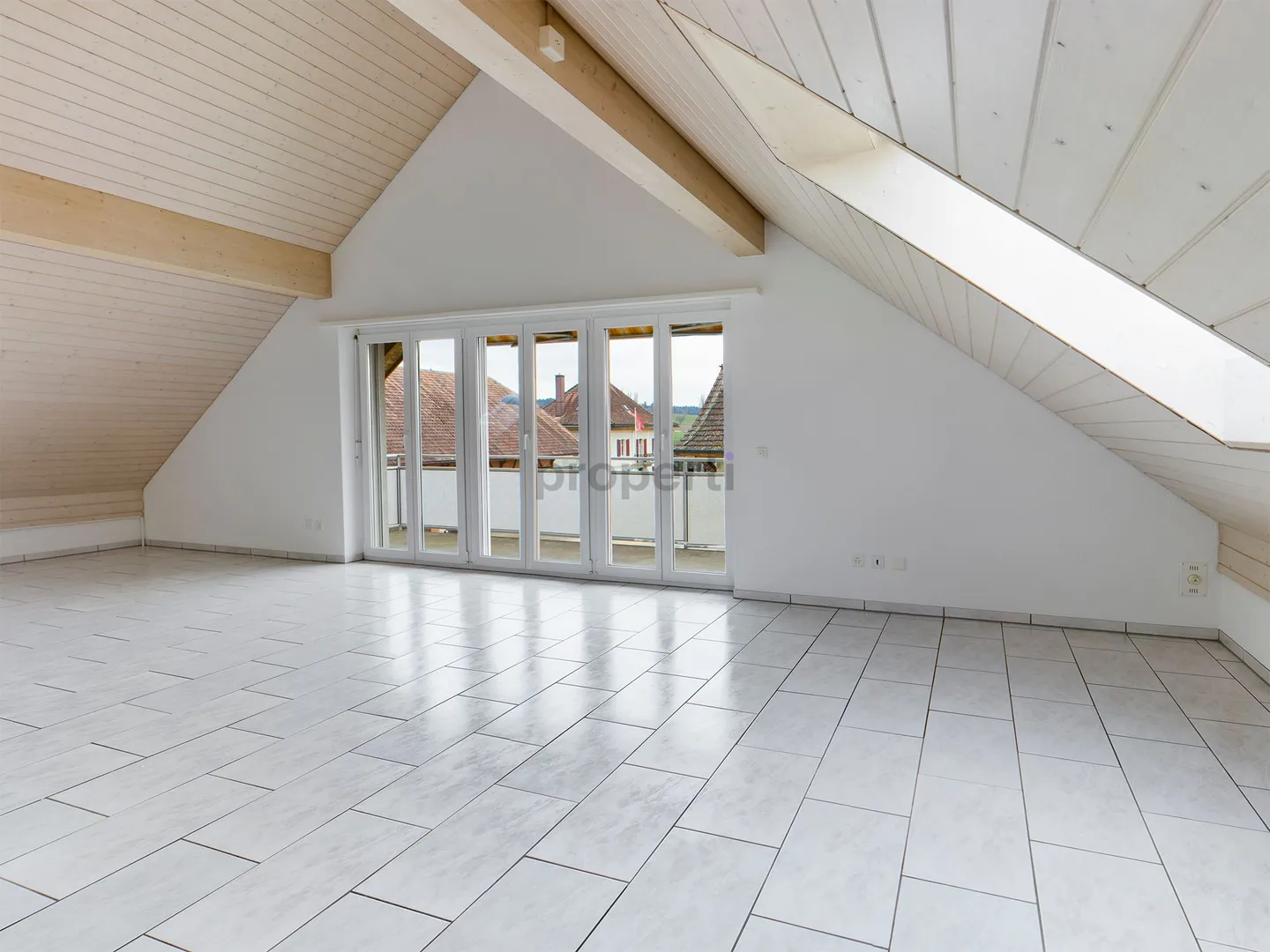 Light-Filled Attic Apartment with Sunny South Balcony - Photo 1 of 8