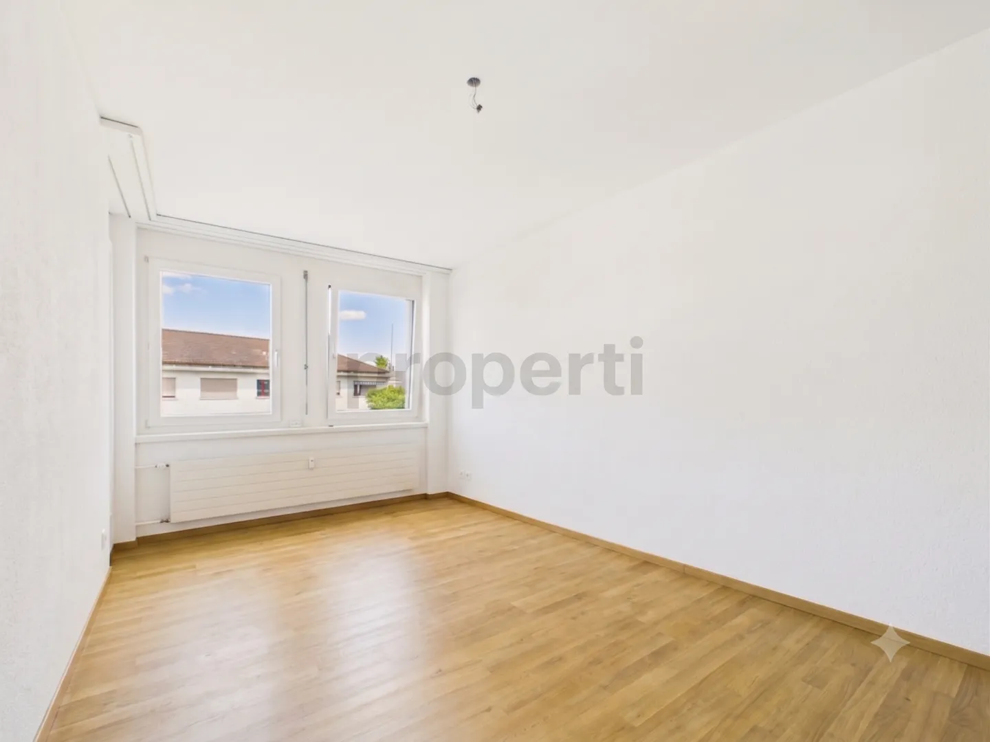 Sonnige Wohnung mit Balkon - Foto 4 von 11