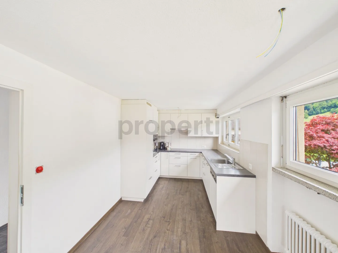Moderne 4.5-Zimmer-Wohnung mit Balkon und Kamin in Mels - Foto 2 von 13