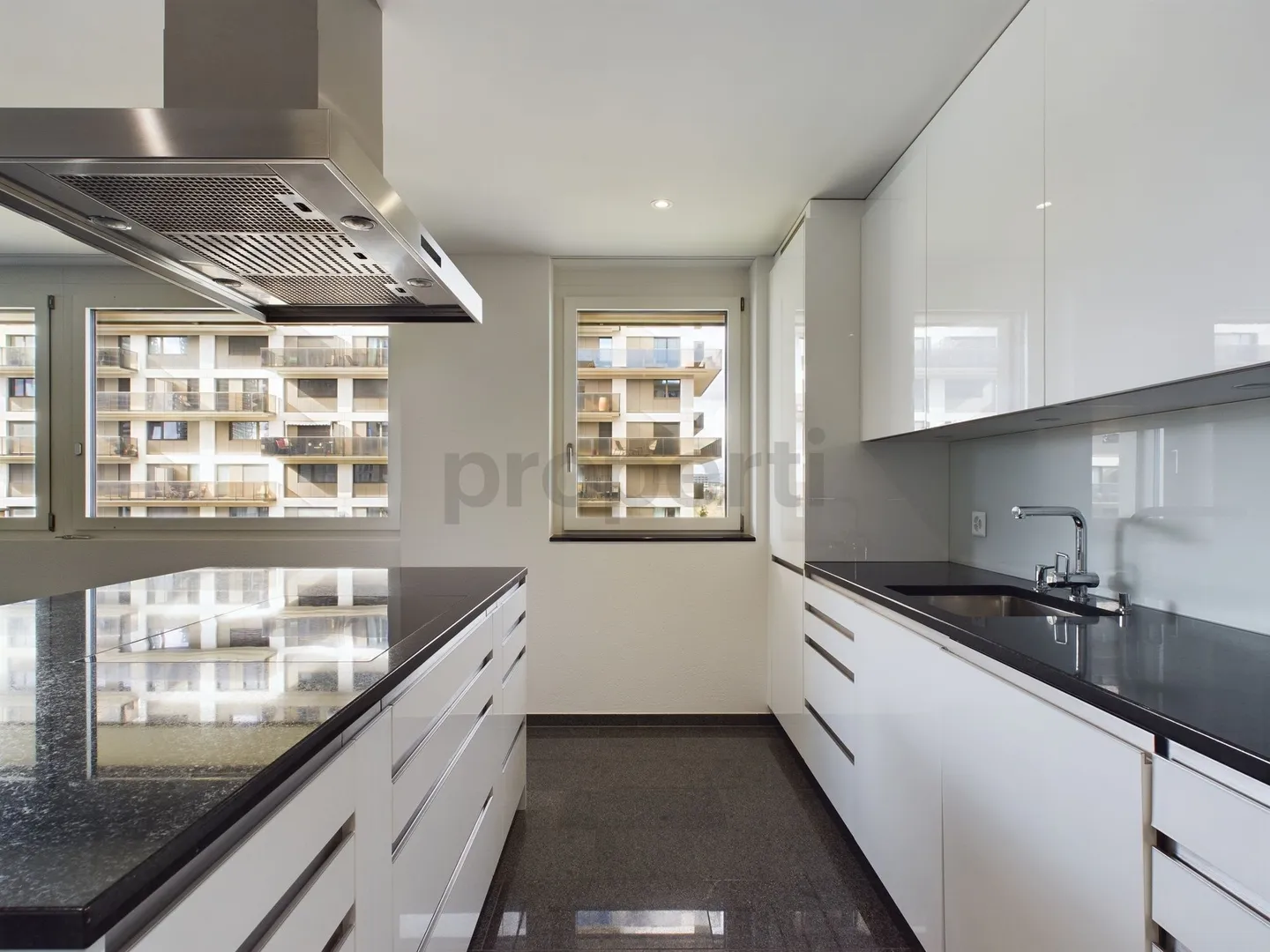 6th floor with impressive views, Minergie standard and modern kitchen - Photo 4 of 11