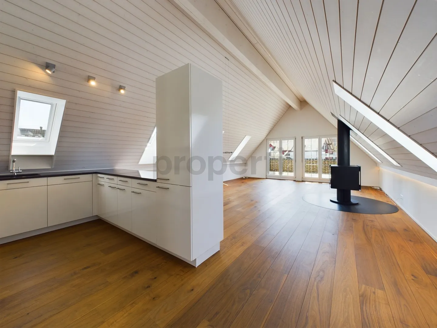 Stylish and Cozy 3.5-Room Attic Apartment with Fireplace in Niederglatt - Photo 1 of 11