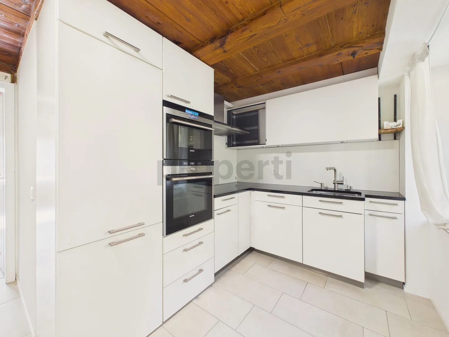 Idylle résidentielle avec jardin et véranda - Appartement 3.5 pièces - Photo 7 sur 13