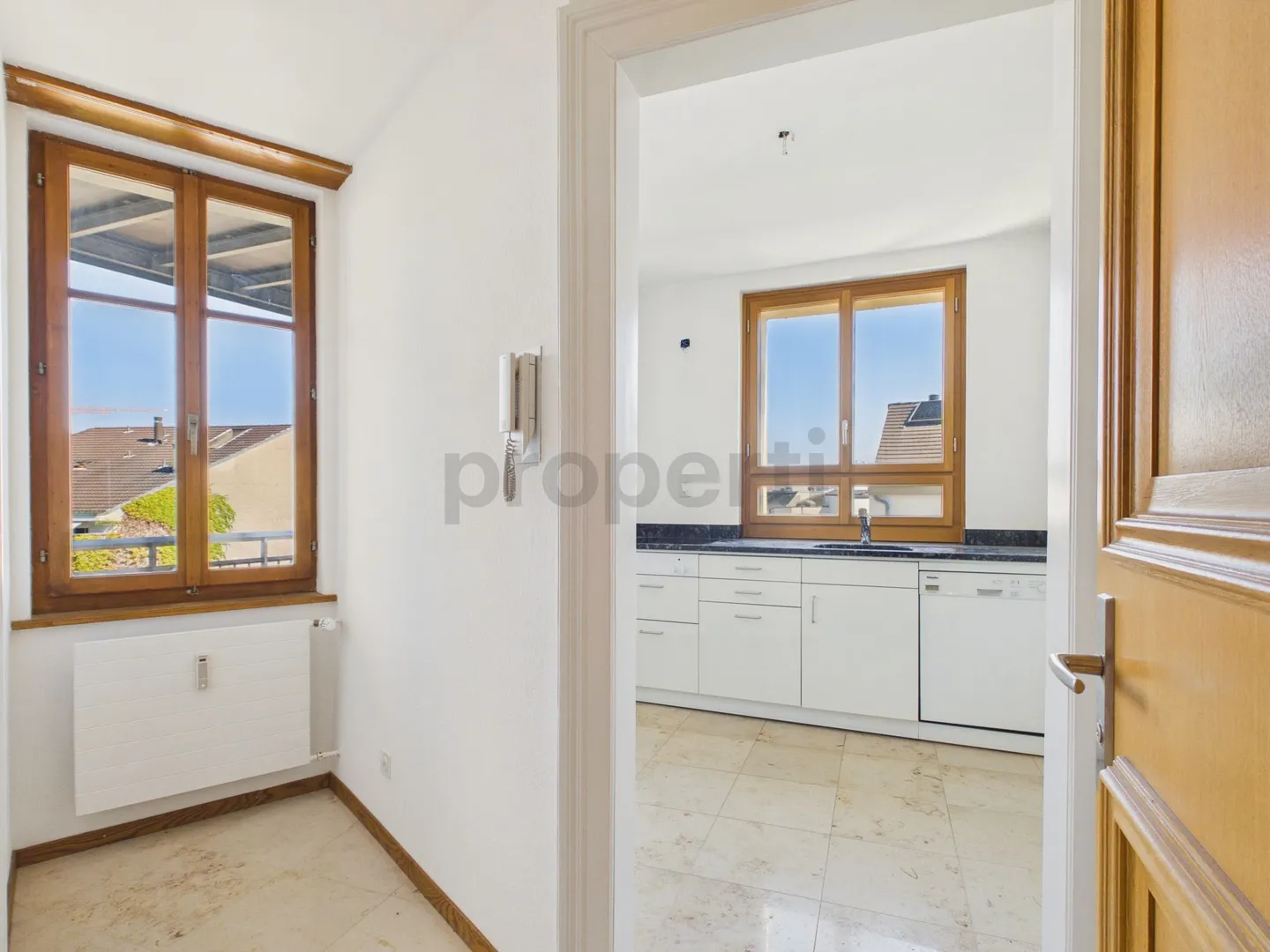 Charming Living with Balcony and Historic Flair - Photo 2 of 13