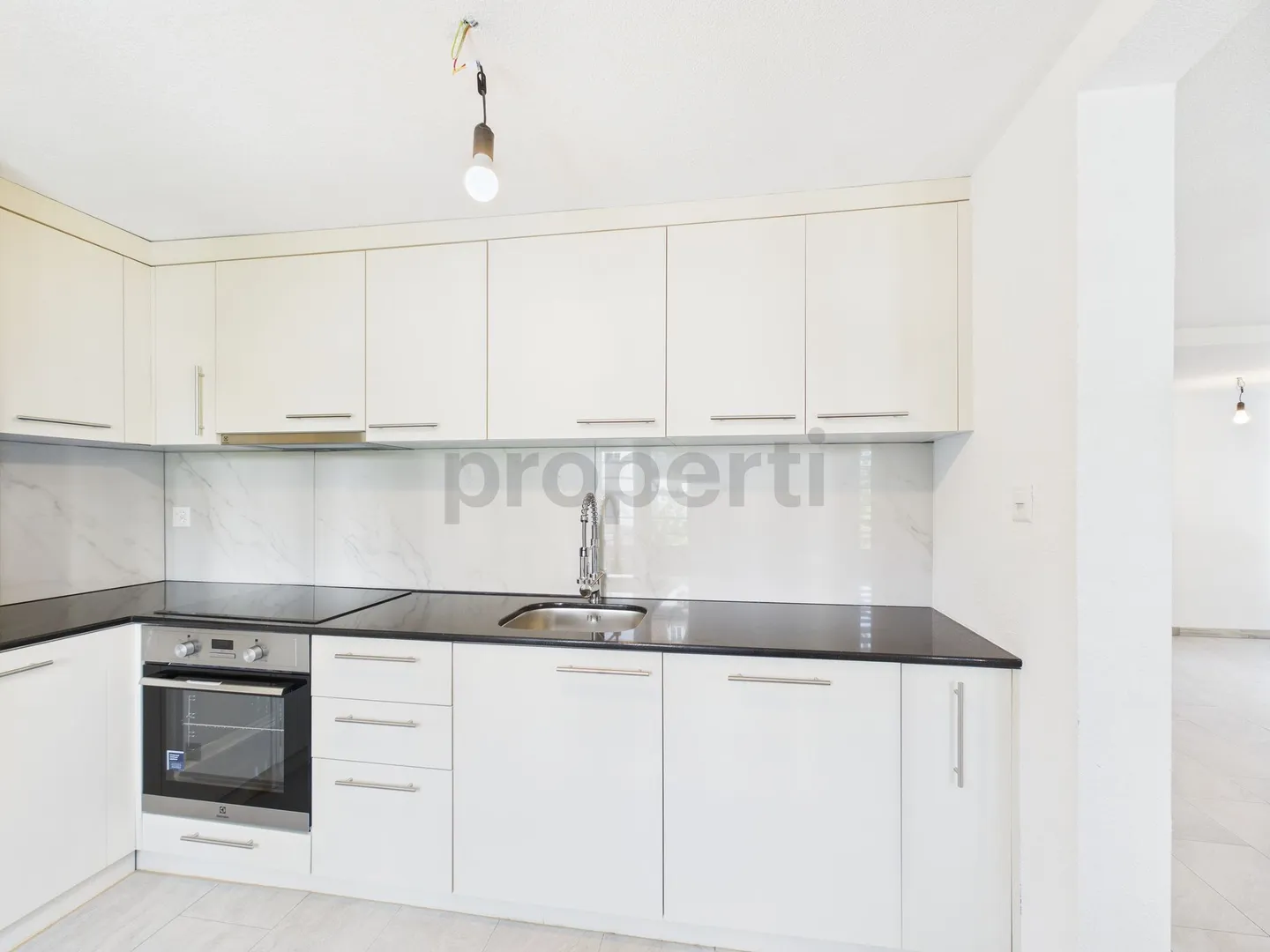 Charming and Sunny Home in the Green with this 3.5-Room Apartment in Ebnat-Kappel - Photo 2 of 12