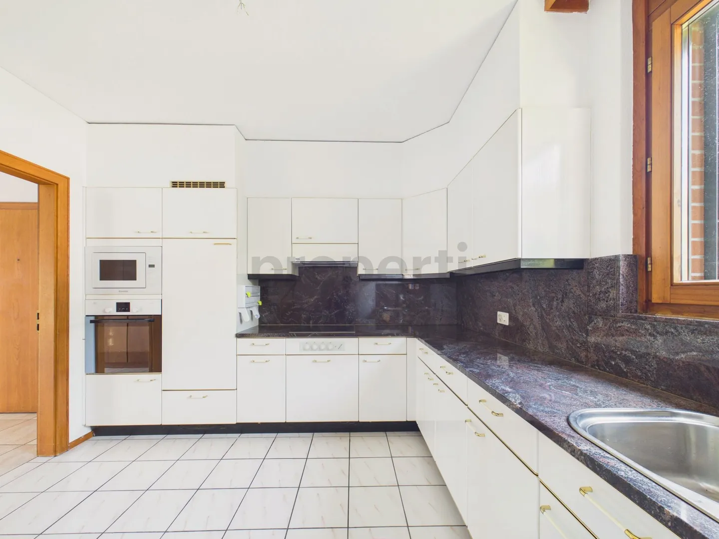 Appartement spacieux dans un cadre verdoyant - Photo 7 sur 13