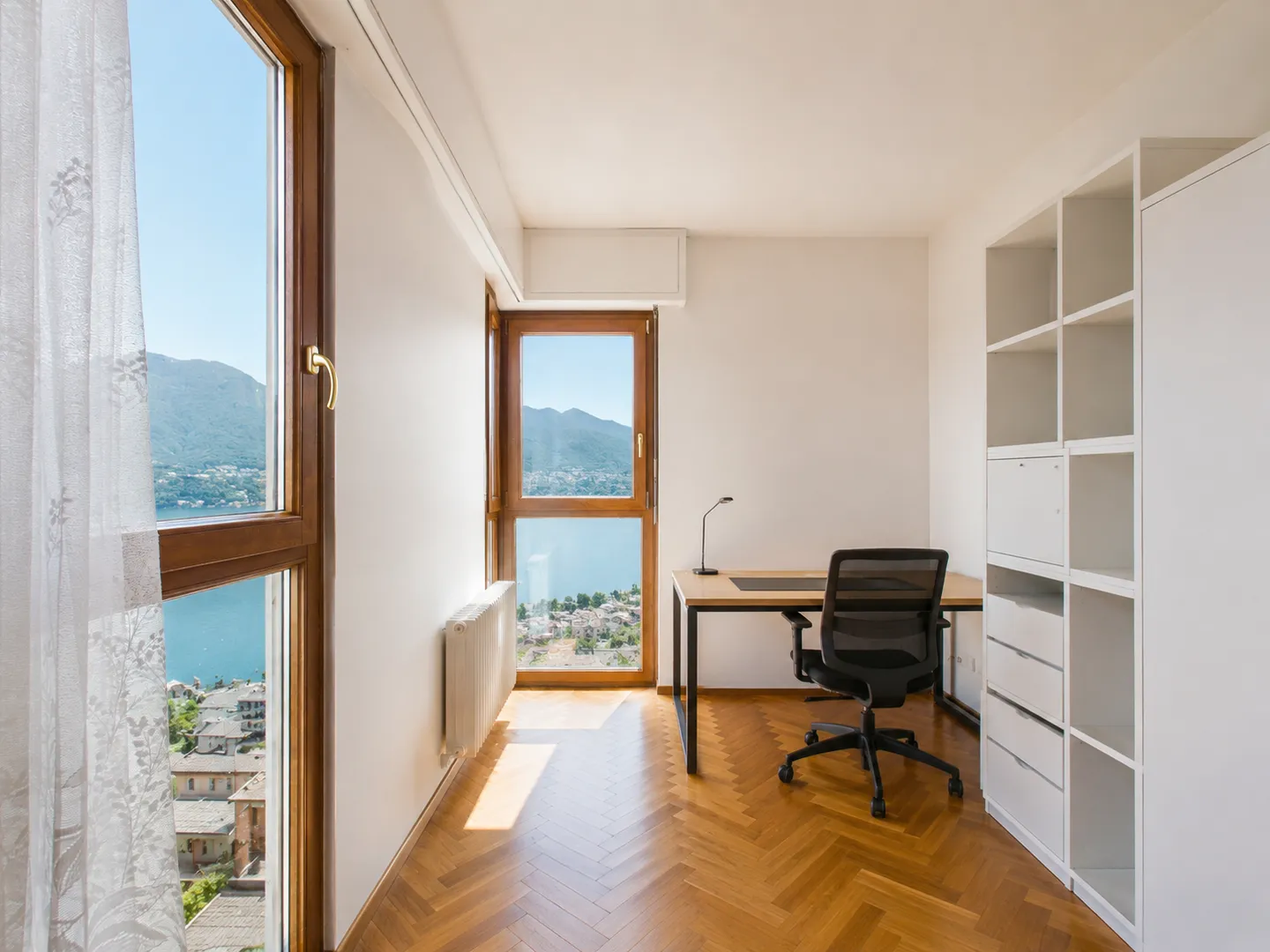 Appartement exceptionnel de 3,5 pièces avec vue sur le lac à Pazzallo - Photo 7 sur 11