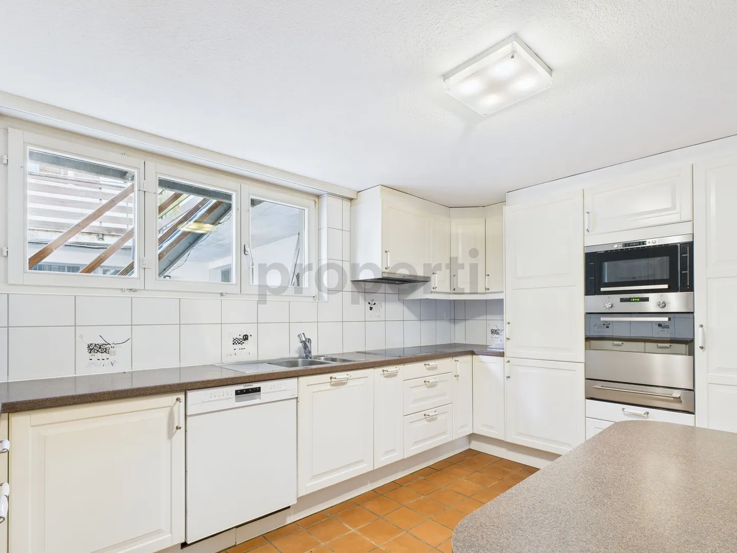 Charming 4.5-room maisonette apartment in a quiet location in Wittnau - Photo 4 of 10