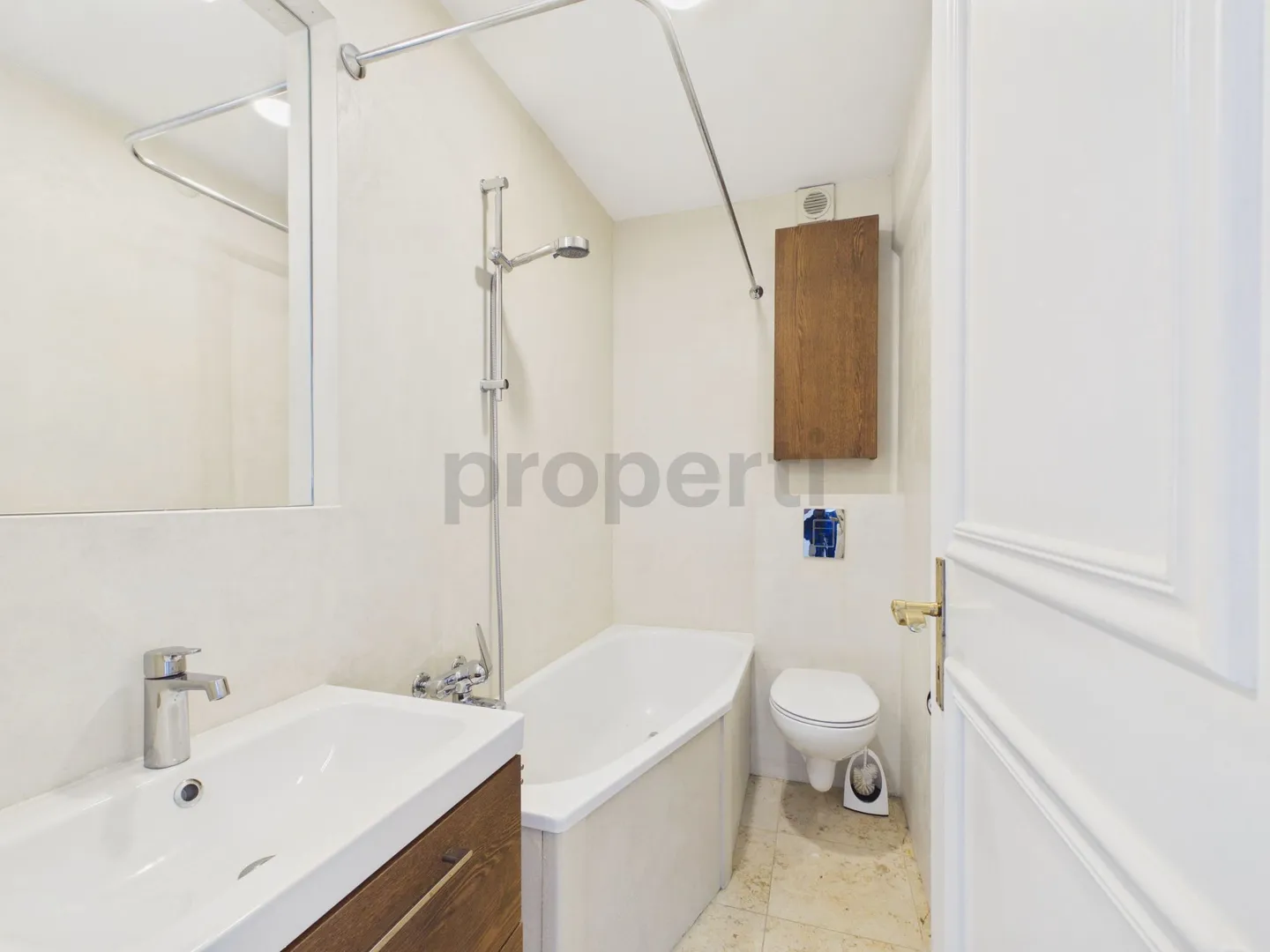 Charming Living with Balcony and Historic Flair - Photo 7 of 13