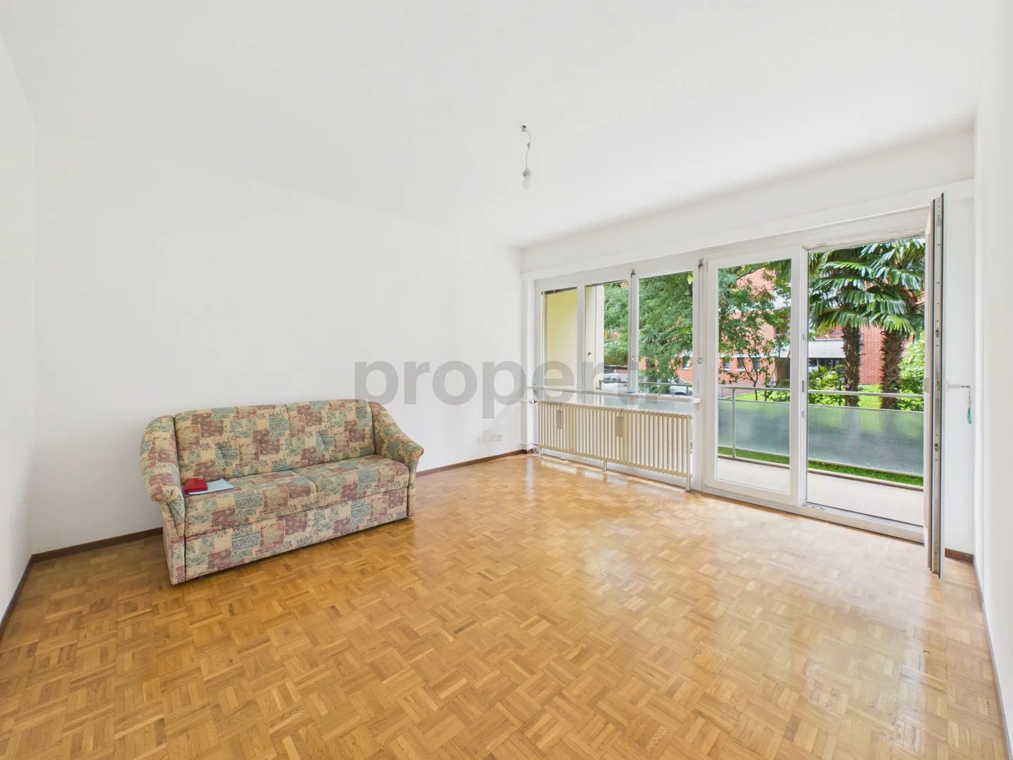 Quiet 2.5-room apartment in Agno / Second home possible - Photo 1 of 8