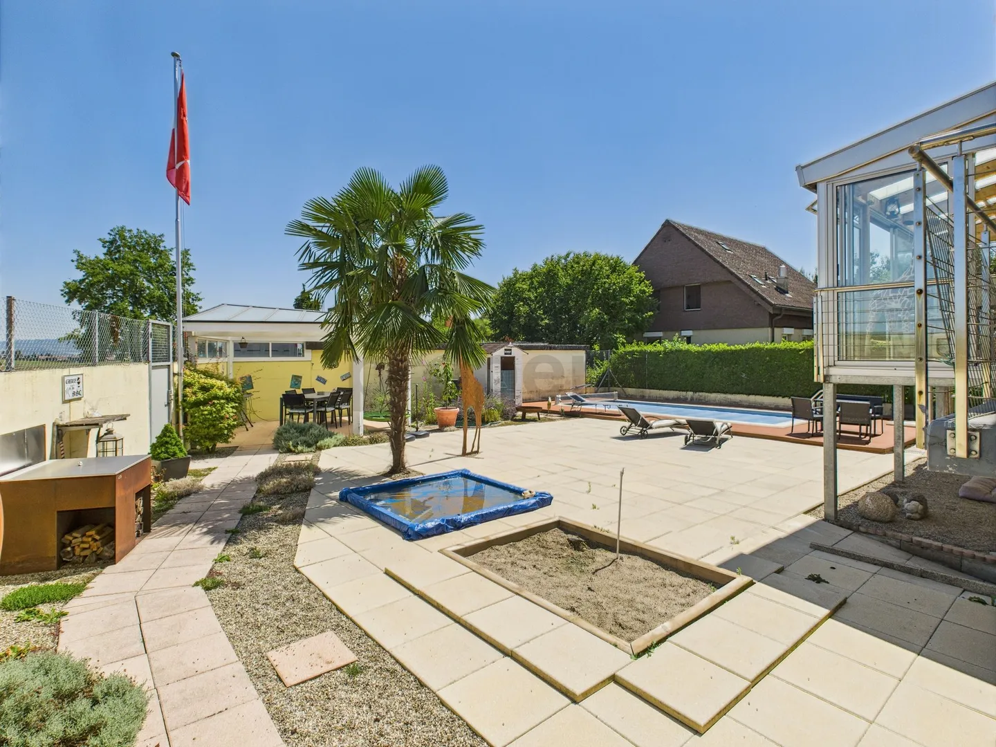 4.5-Zimmer-Parterrewohnung mit Wintergarten, Gartenparadies und Pool in Uettligen - Foto 1 von 10
