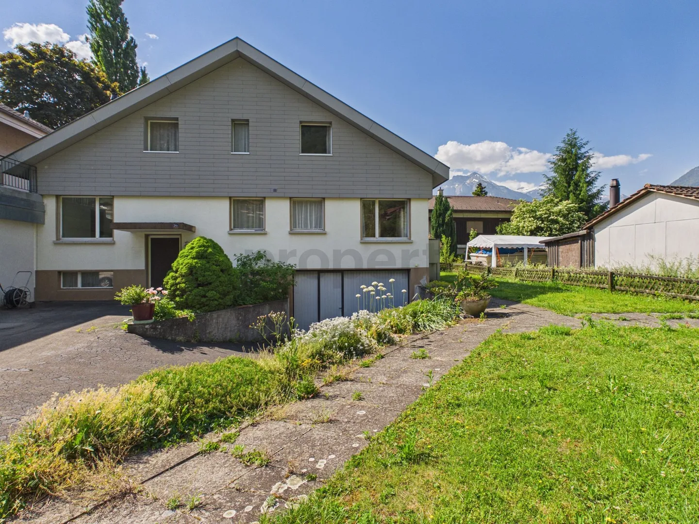 Spacieuse maison individuelle de 6,5 pièces avec jardin dans un emplacement unique sur l'Aare à Interlaken - Photo 1 sur 13