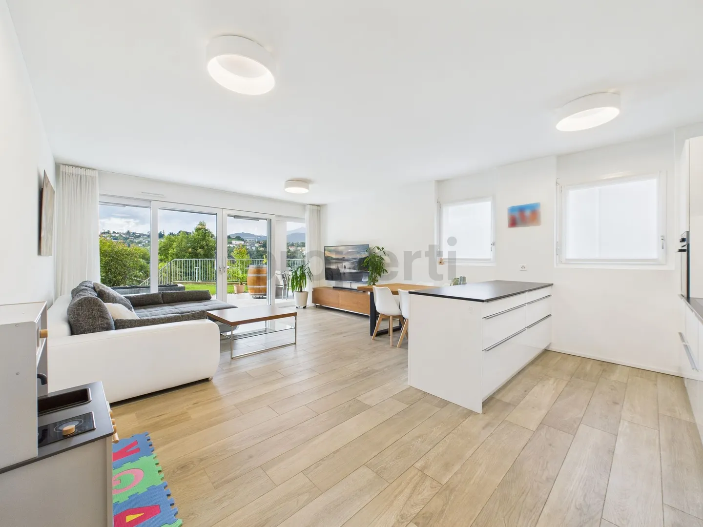 Modern Elegance with Private Garden in Pazzallo - Photo 4 of 13