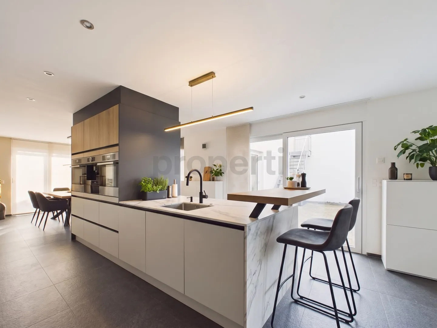 High-quality furnishings, protected courtyard & generous space offering! - Photo 4 of 13