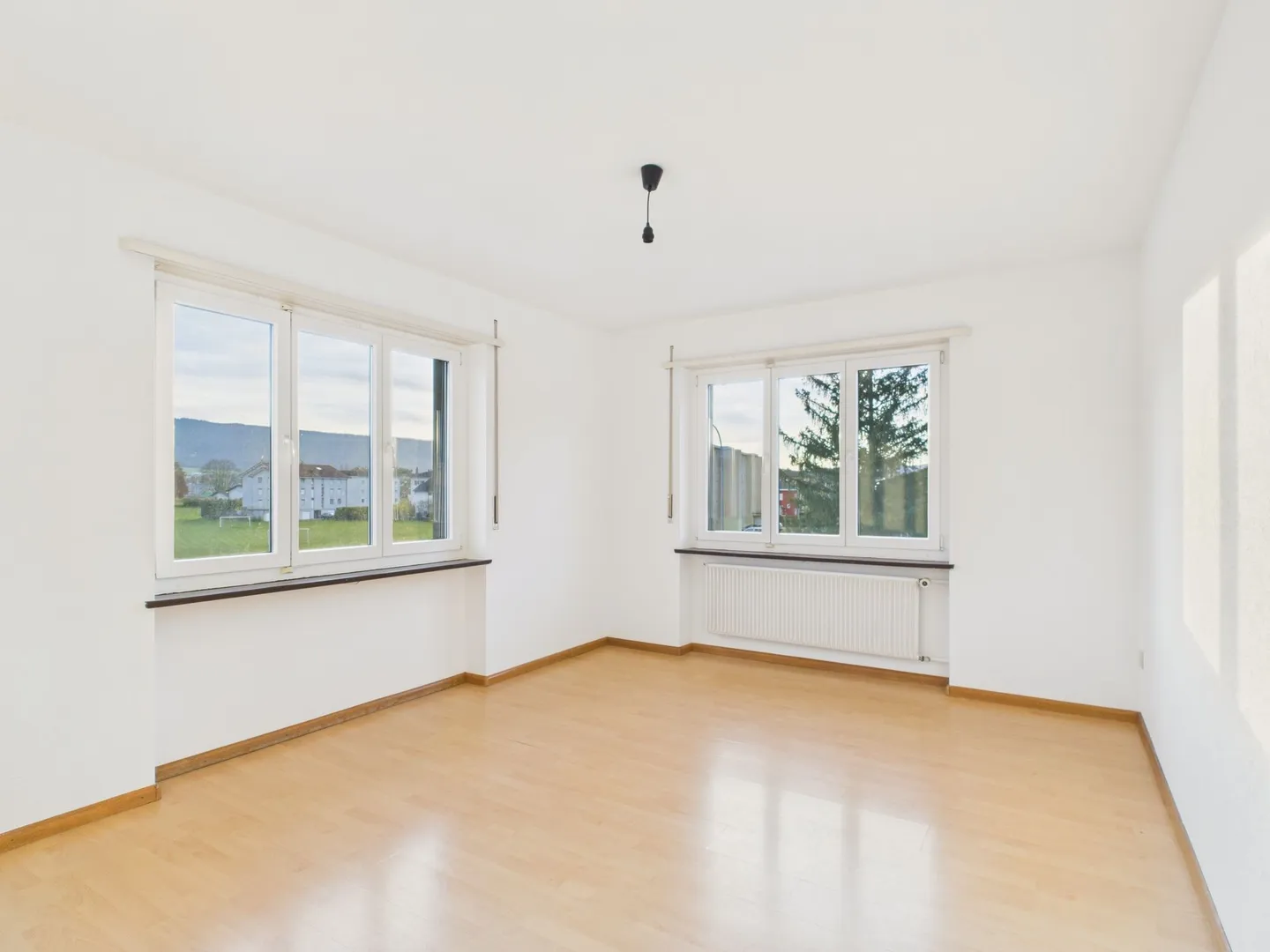 Appartement spacieux de 4.5 pièces dans un petit immeuble calme à Delémont - Photo 6 of 13