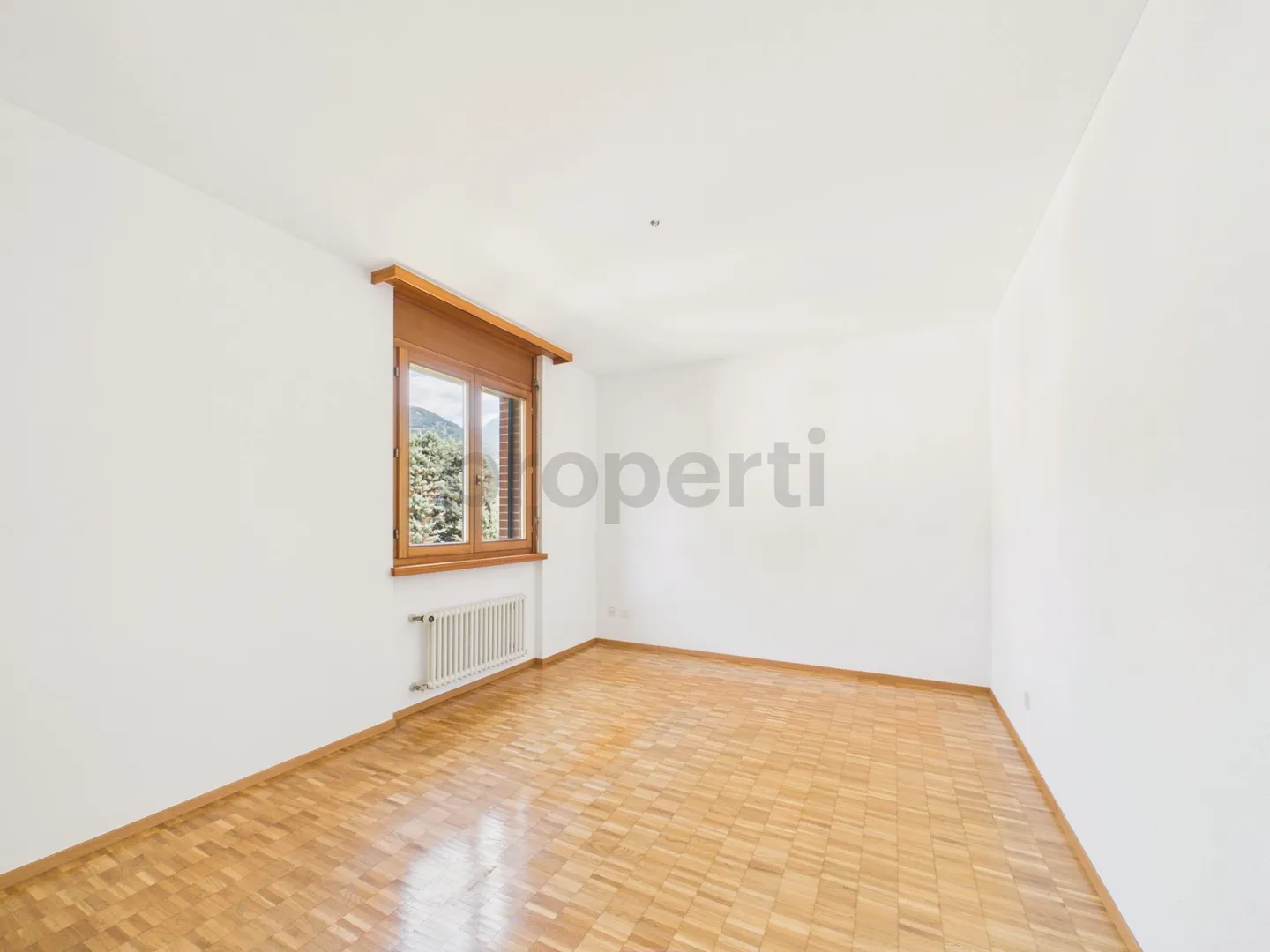 Appartement spacieux dans un cadre verdoyant - Photo 12 sur 13