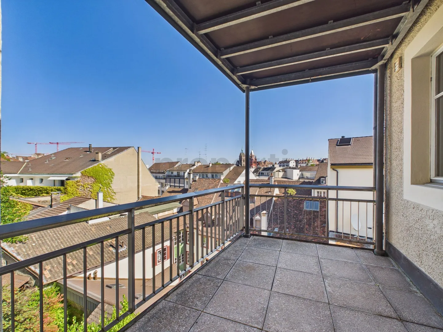 Charming Living with Balcony and Historic Flair - Photo 8 of 13