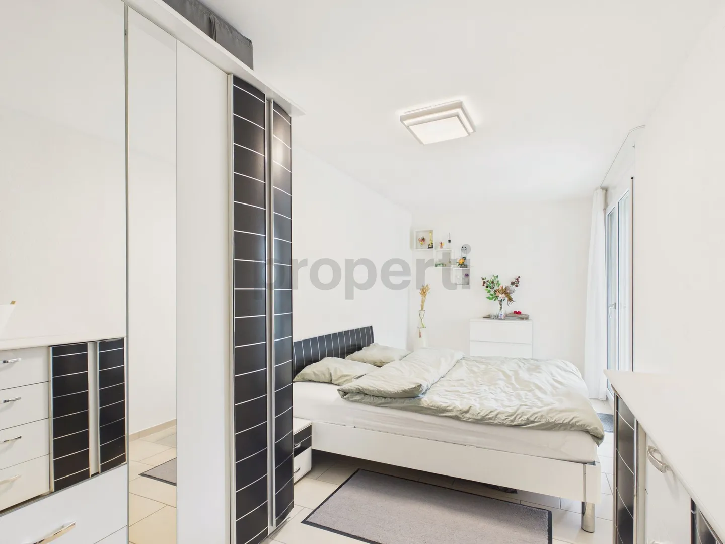 Moderne 5.5-Zimmer Wohnung mit Garten - Foto 7 von 13