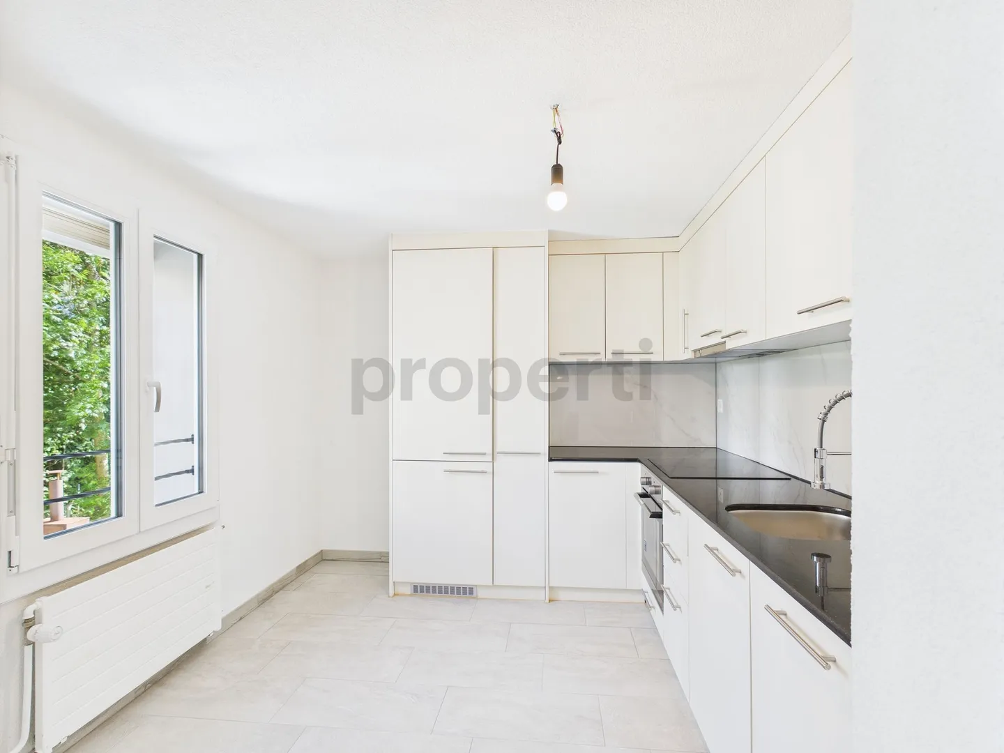 Charming and Sunny Home in the Green with this 3.5-Room Apartment in Ebnat-Kappel - Photo 4 of 12