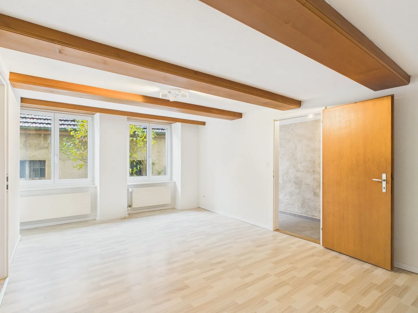 Appartement de 2,5 pièces au rez-de-chaussée à Nuglar - Photo 1 sur 12