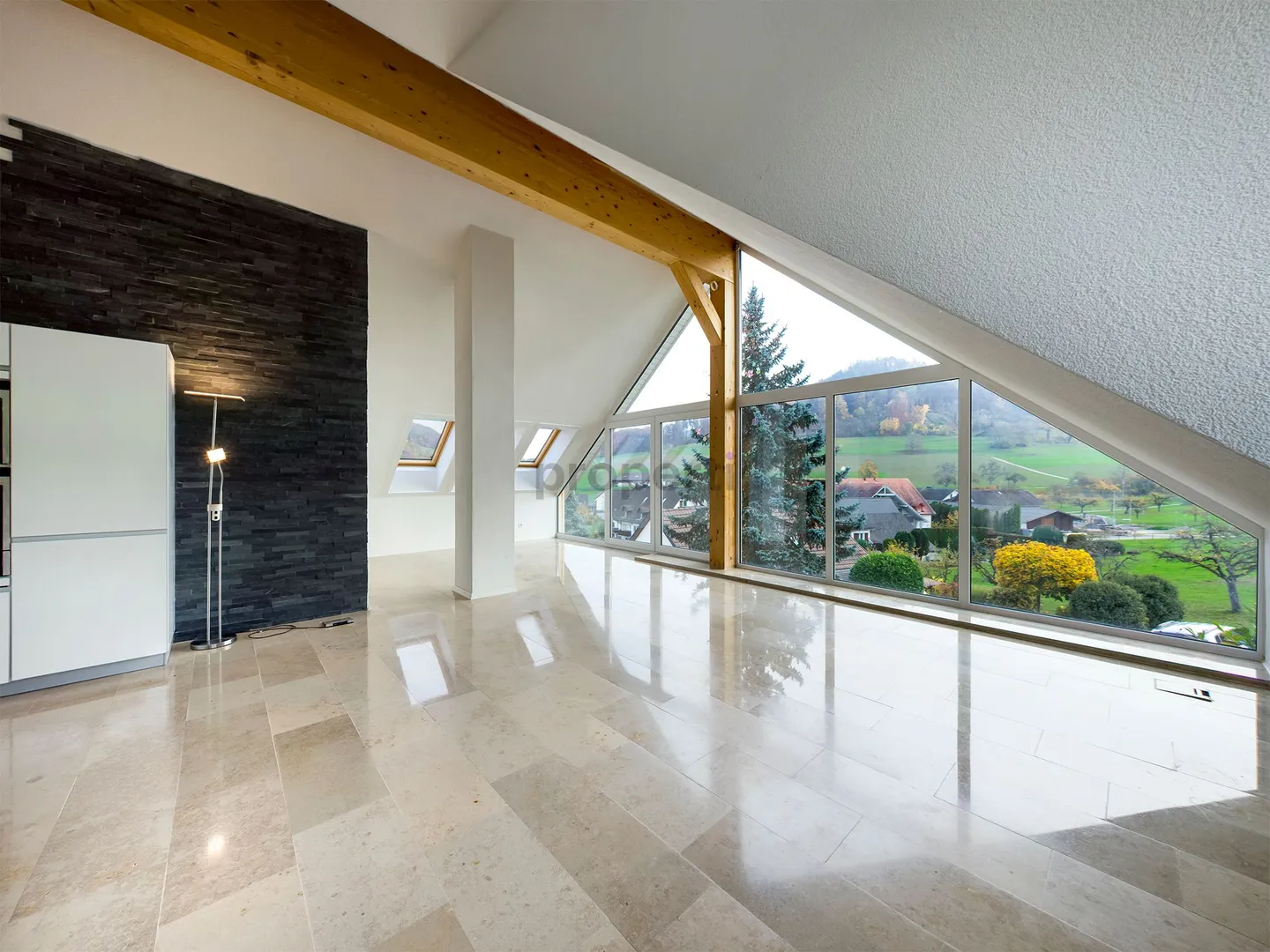 Light-Filled Dream Home in Weiach: Stylish 3.5-Room Attic Apartment with High Ceilings and Great Views - Photo 7 of 13