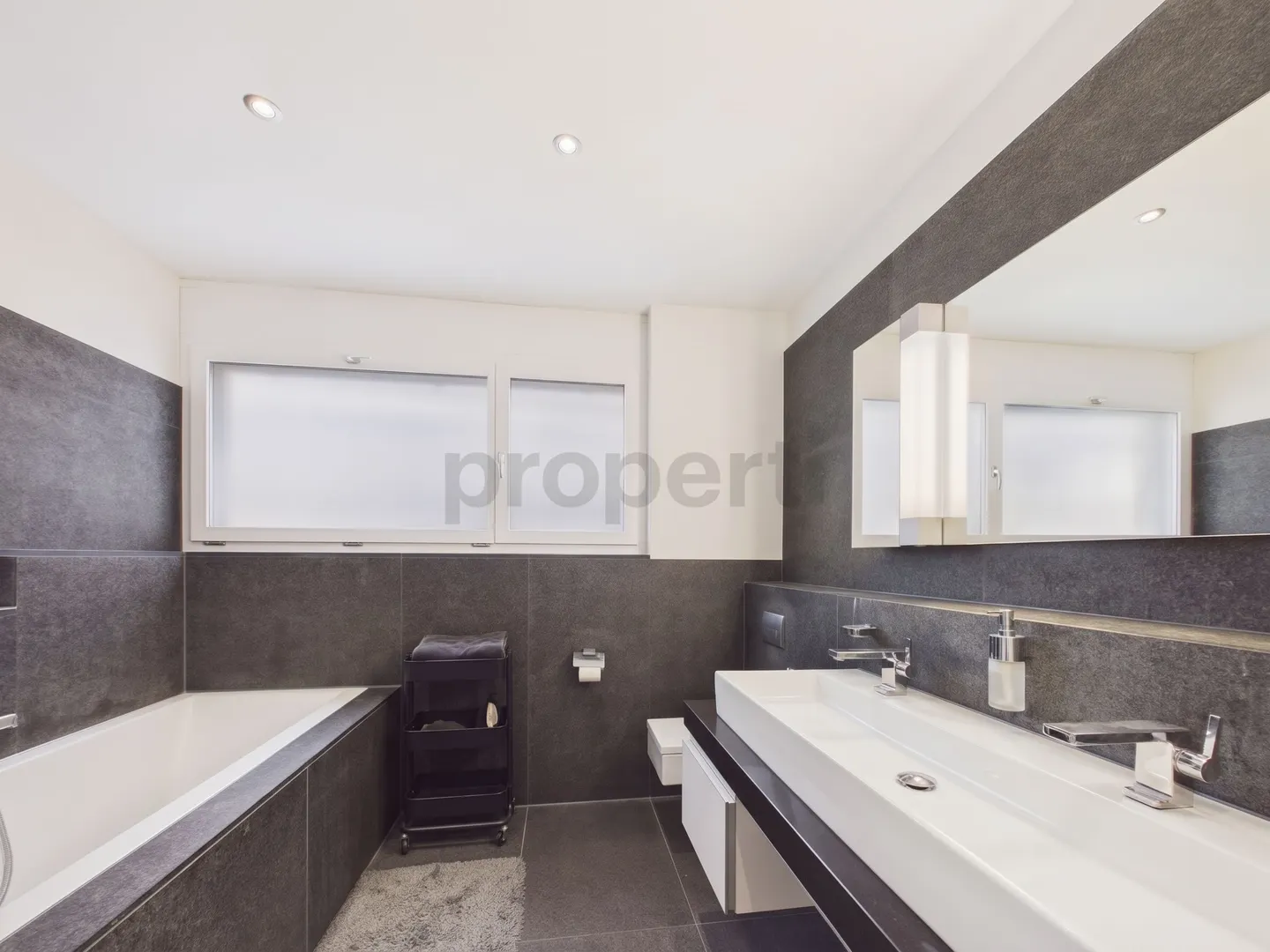 High-quality furnishings, protected courtyard & generous space offering! - Photo 7 of 13