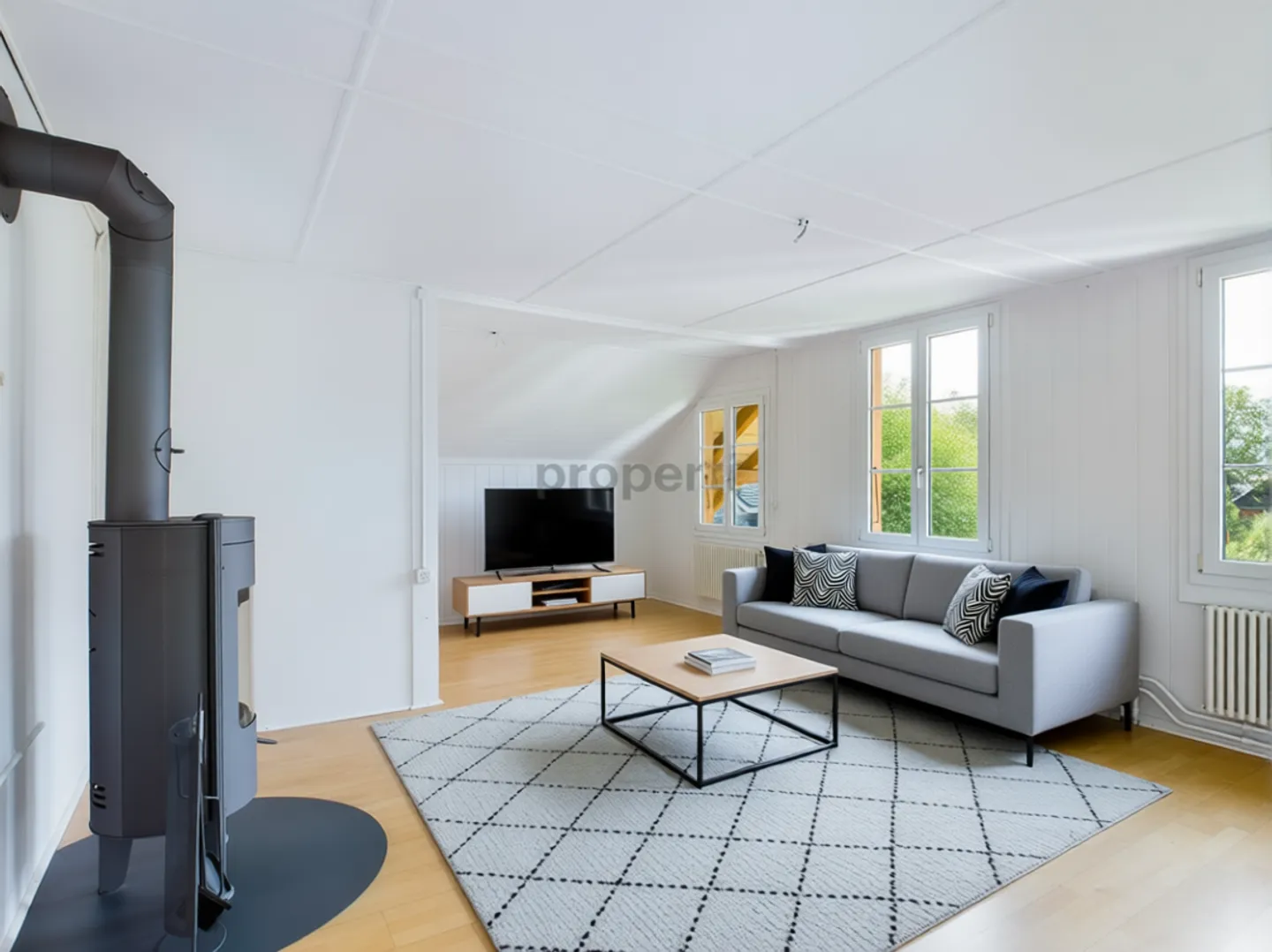 Charmante Dachwohnung in Thierachern - Foto 1 von 11