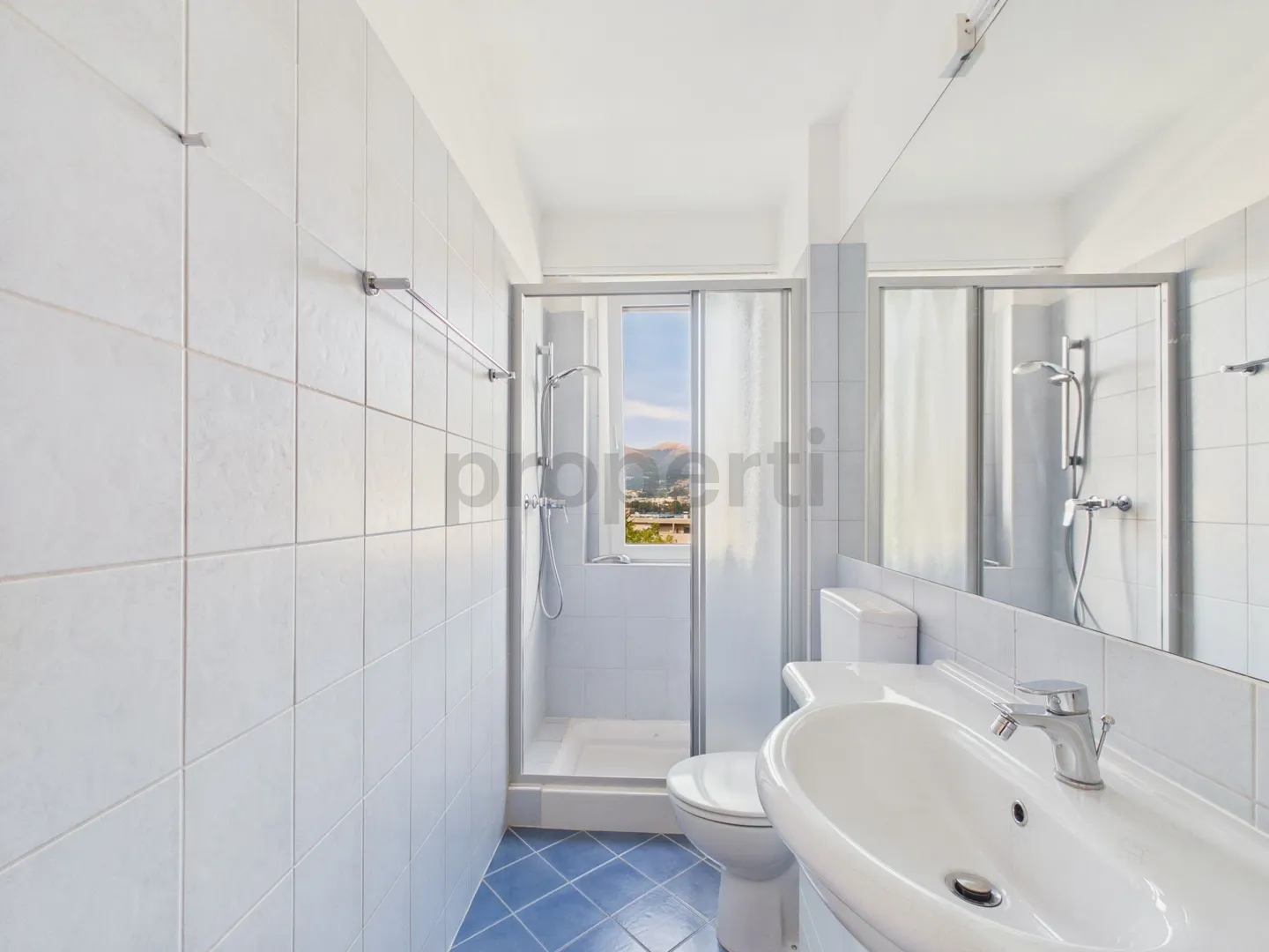 Appartement 2,5 pièces avec vue sur le lac, piscine et toit-terrasse à 360° à Paradiso ! - Photo 8 sur 12