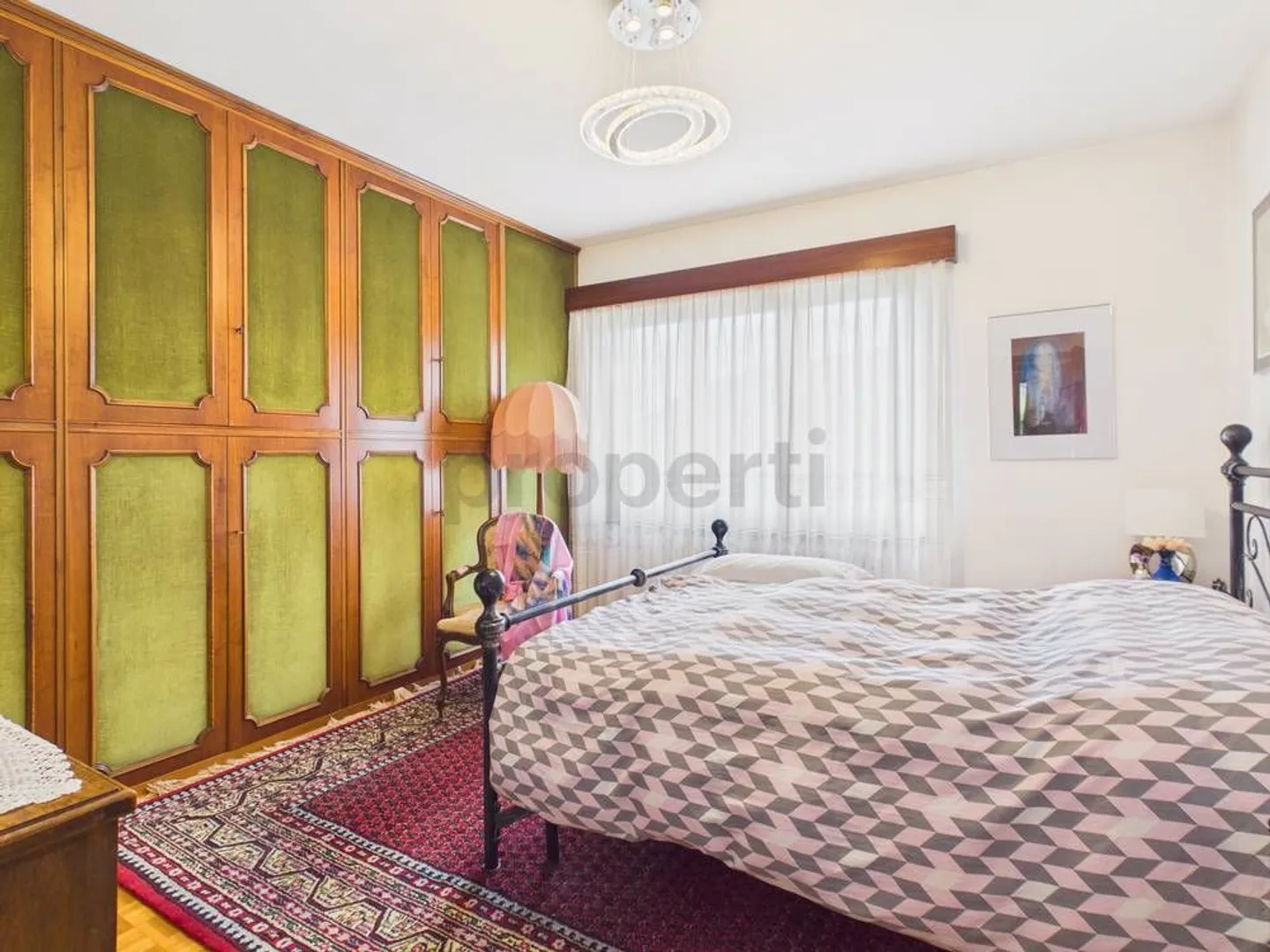 Doppelhaushälfte mit Panoramablick auf den Luganersee und privatem Garten in Bissone - Foto 12 von 13