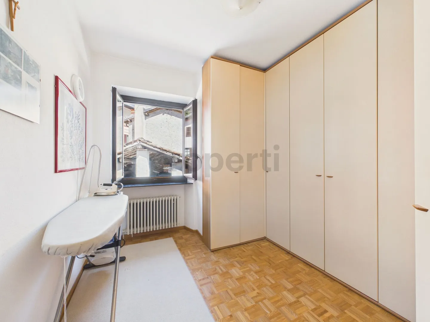 Elegantes Einfamilienhaus mit 4,5 Zimmern und Garage im Zentrum von Gravesano - Foto 10 von 13