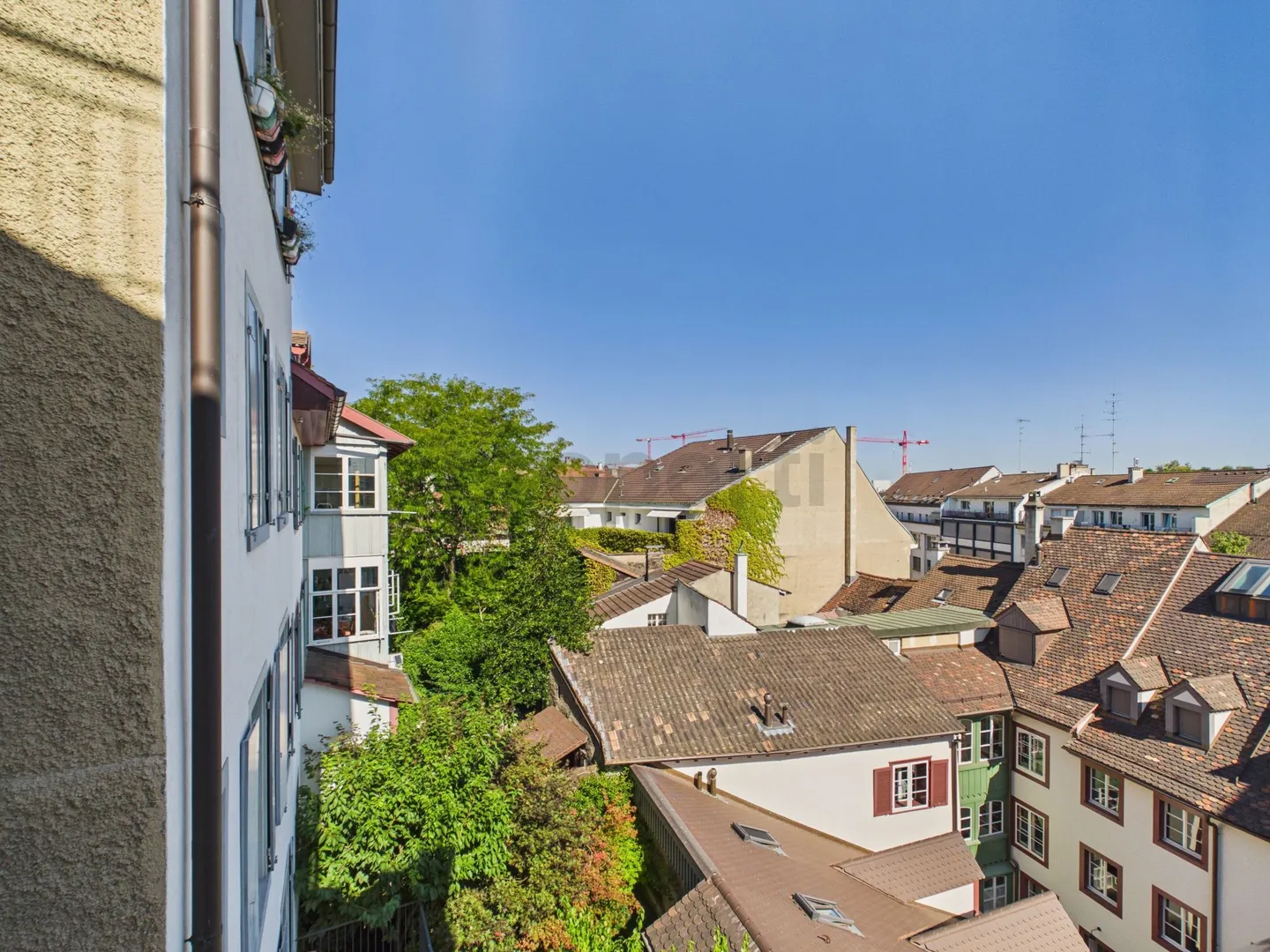 Charming Living with Balcony and Historic Flair - Photo 11 of 13