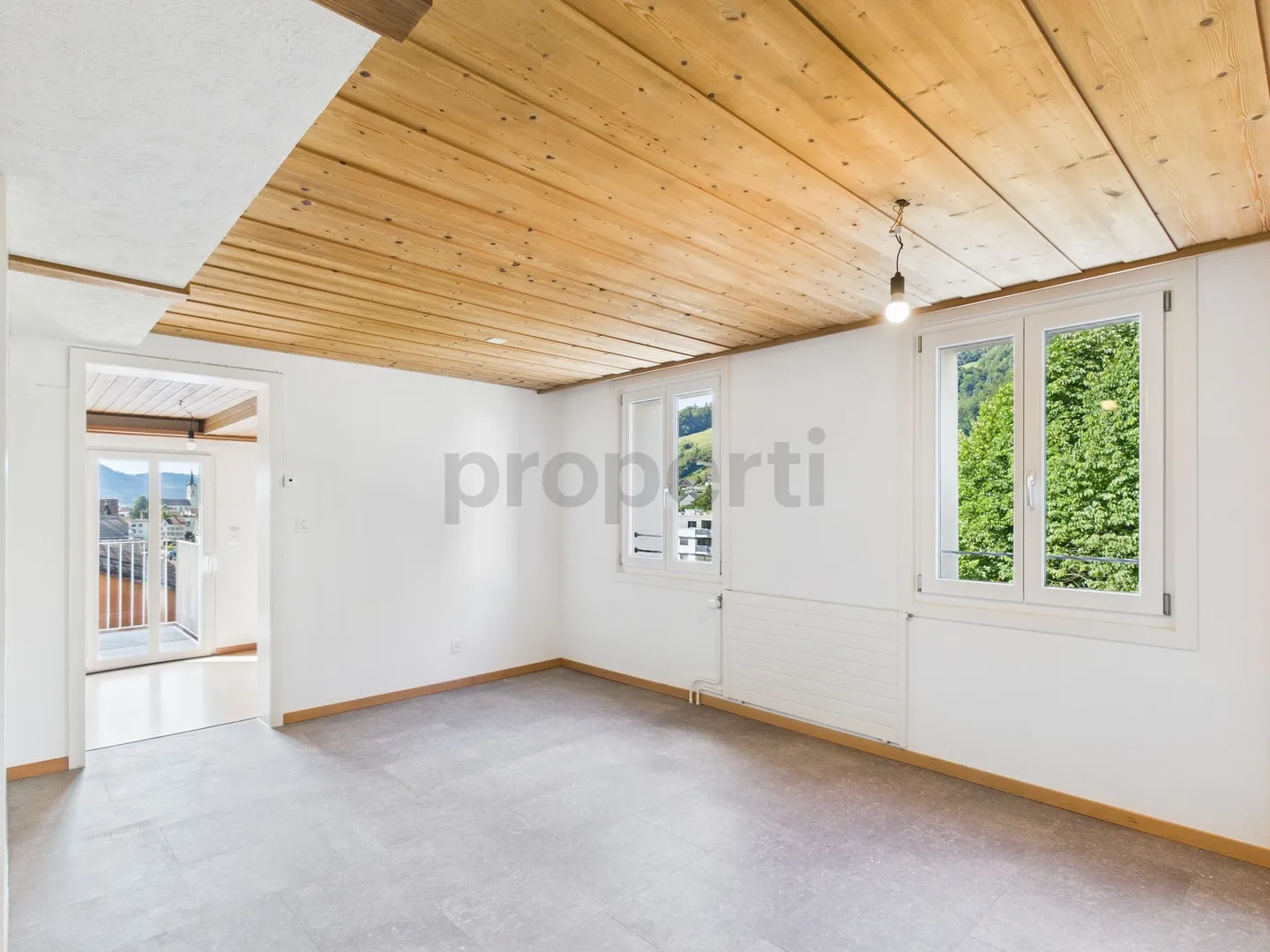 Cozy 3.5-Room Attic Apartment in Ebnat-Kappel - Photo 1 of 12