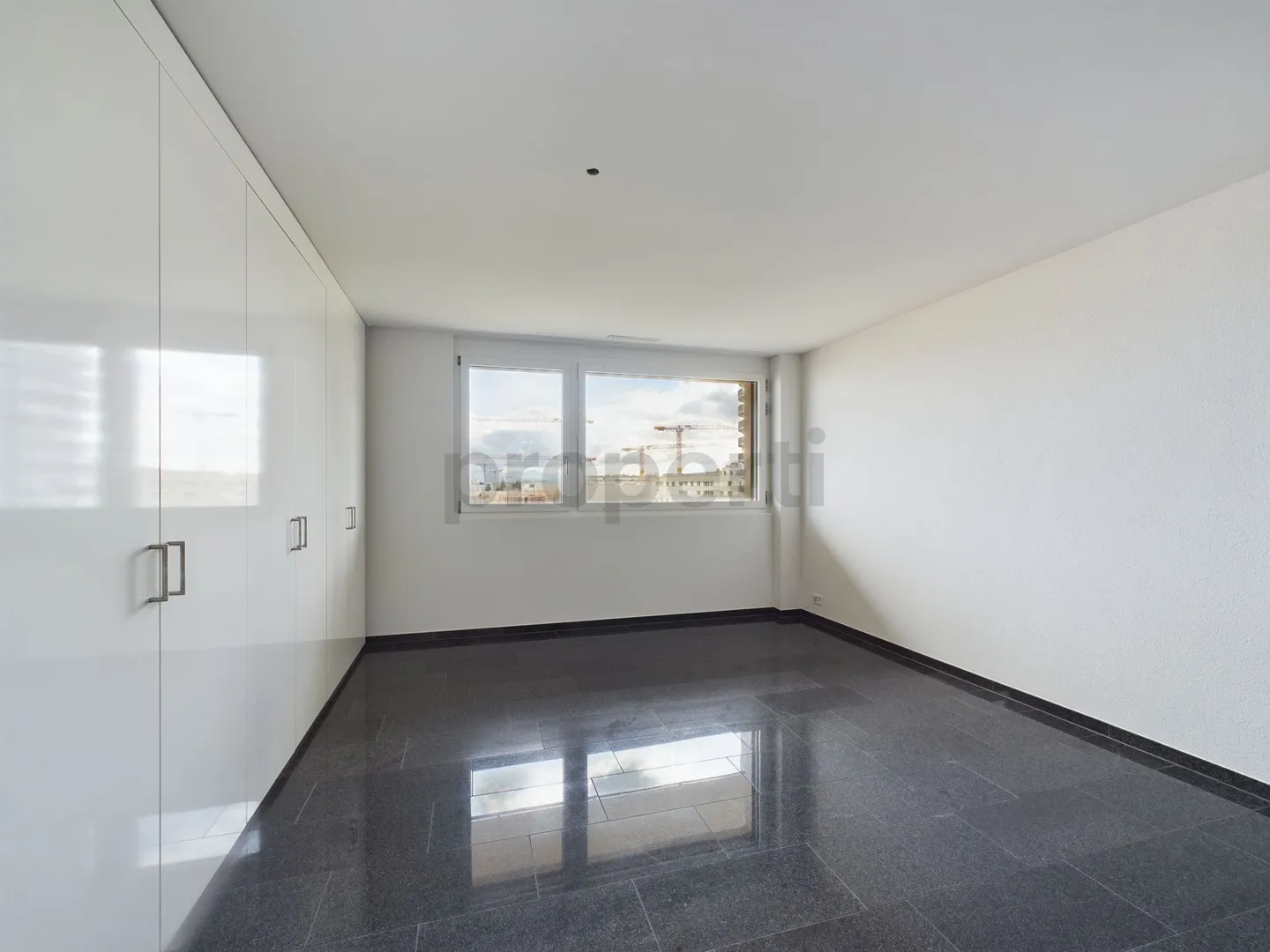 6th floor with impressive views, Minergie standard and modern kitchen - Photo 5 of 11