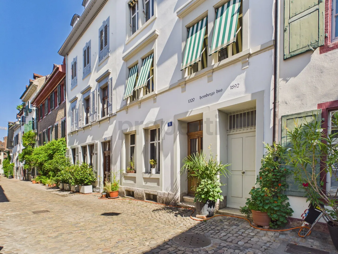 Charming Living with Balcony and Historic Flair - Photo 12 of 13