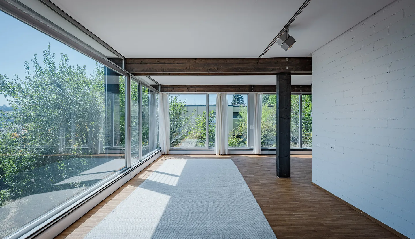 FRESHLY RENOVATED ARCHITECT'S HOUSE WITH ALPINE VIEW AND EXPANSION POTENTIAL - Photo 3 of 5