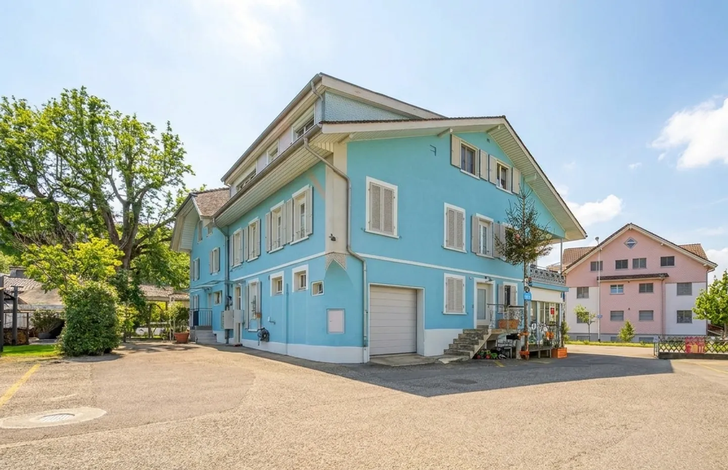 WELL-MAINTAINED MULTI-FAMILY HOUSE WITH EIGHT APARTMENTS AND RENTAL POTENTIAL - Photo 1 of 8