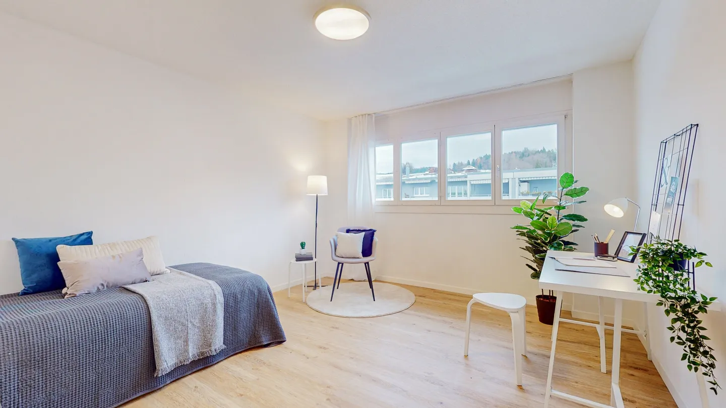 BRIGHT LIVING AREA WITH SWEDISH STOVE - PENTHOUSE IN BAAR - Photo 4 of 5