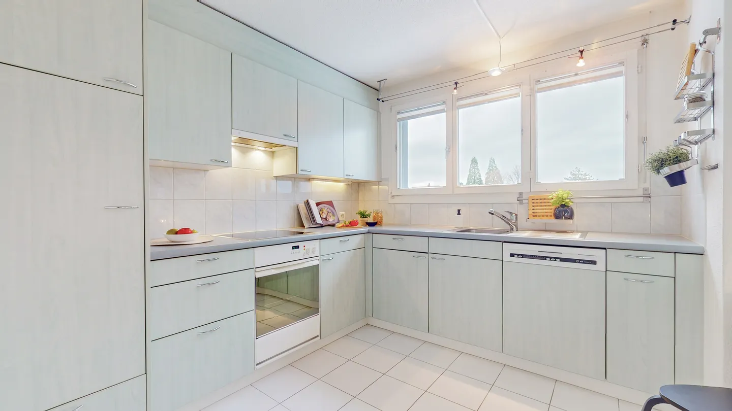 BRIGHT LIVING AREA WITH SWEDISH STOVE - PENTHOUSE IN BAAR - Photo 5 of 5