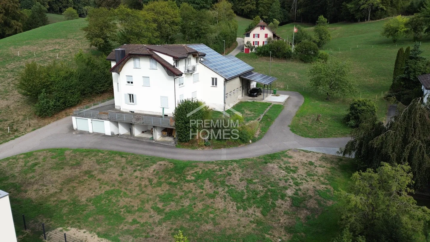 Renovated multi-family house with large building plot & development potential - Photo 2 of 6