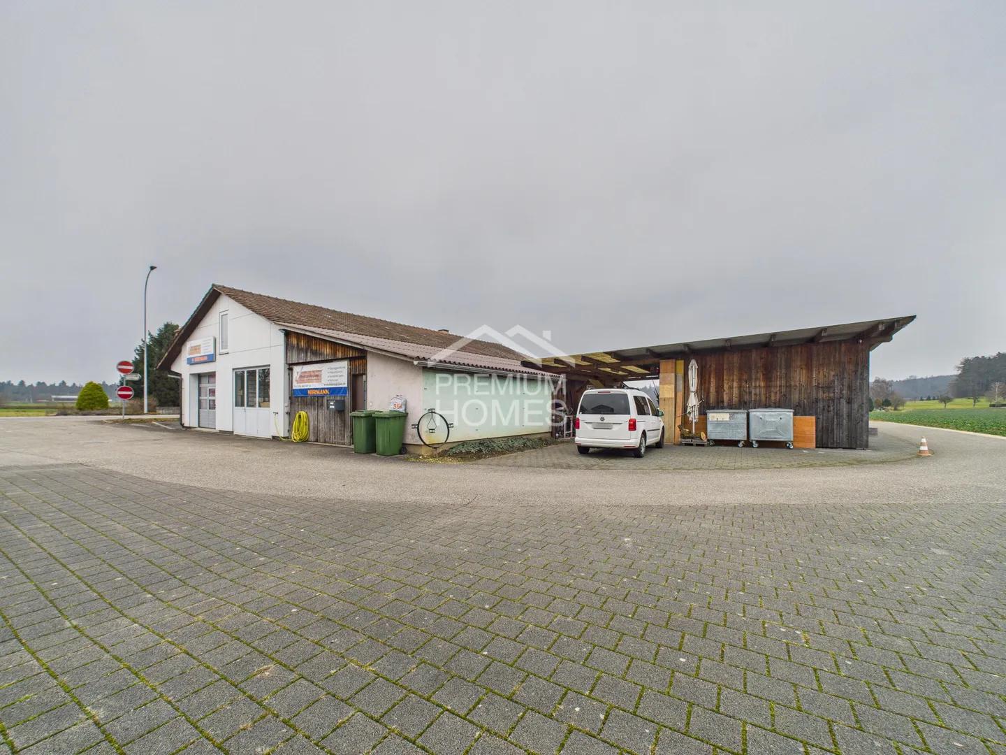 Seltene Kombination aus Gewerbe und Wohnen - Foto 1 von 13