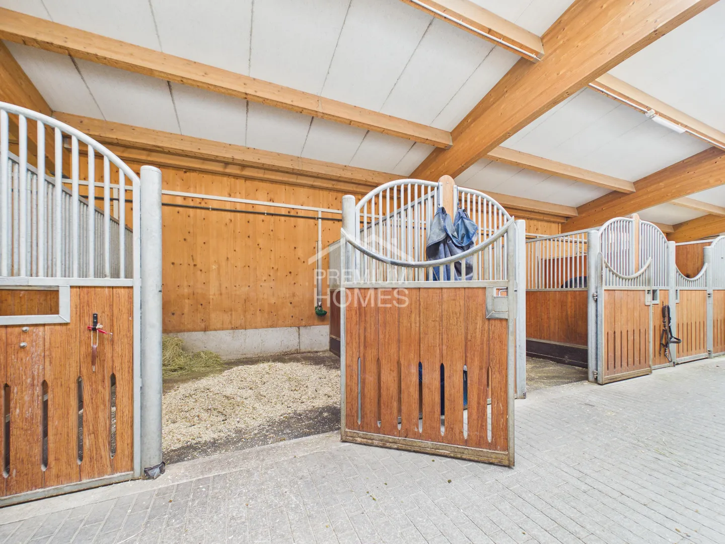 Professional Equestrian Facility with 24 Stalls, Riding Arena, and Residential House! - Photo 4 of 13