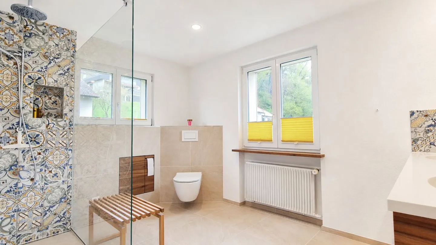 Spacious family house with plenty of space and 924 m² plot in Reigoldswil - Photo 6 of 13