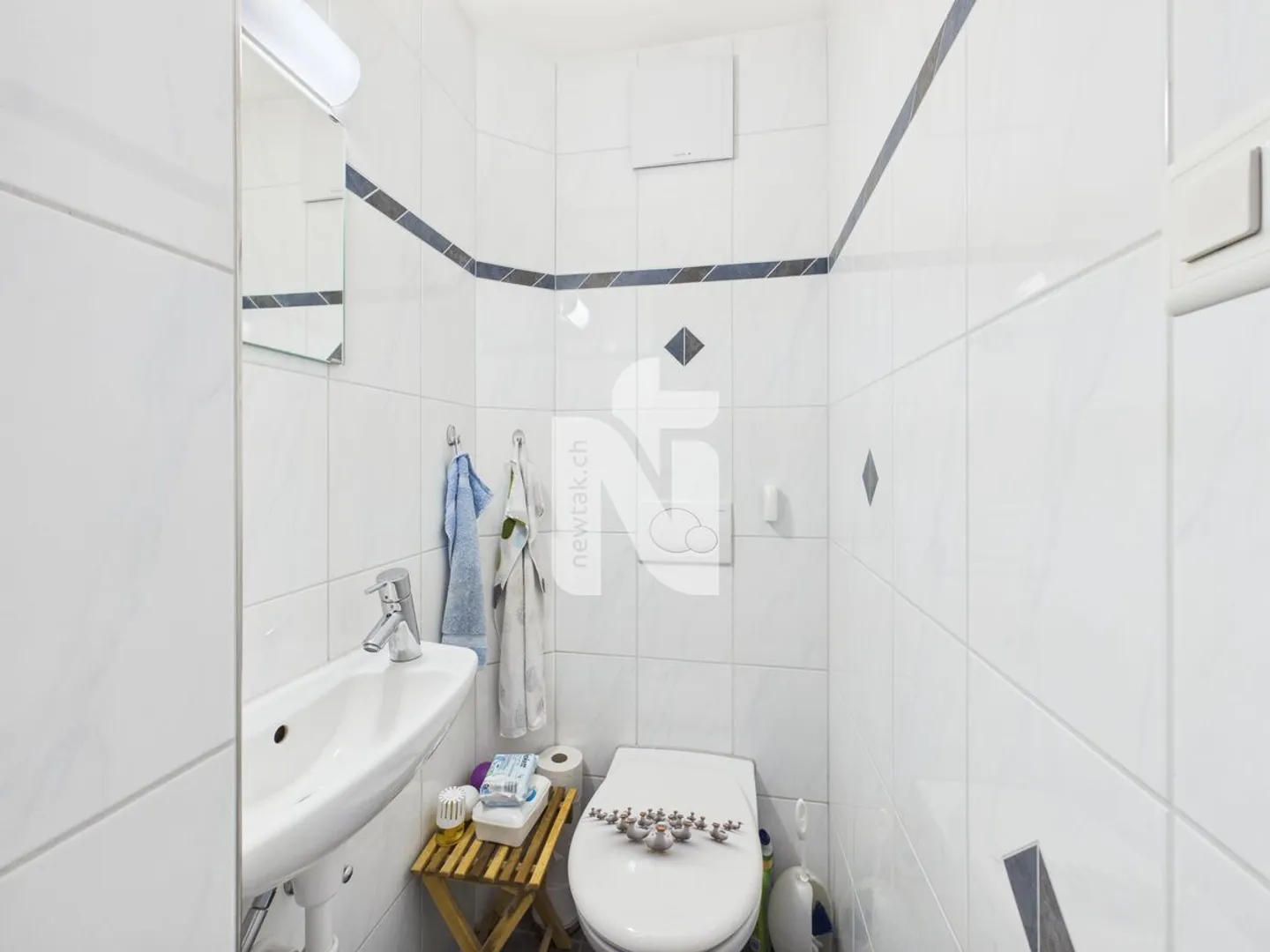 Family-friendly garden apartment with balcony, private garden, garage box, and additional hobby room in the best location on Bruderholz - Photo 12 of 12