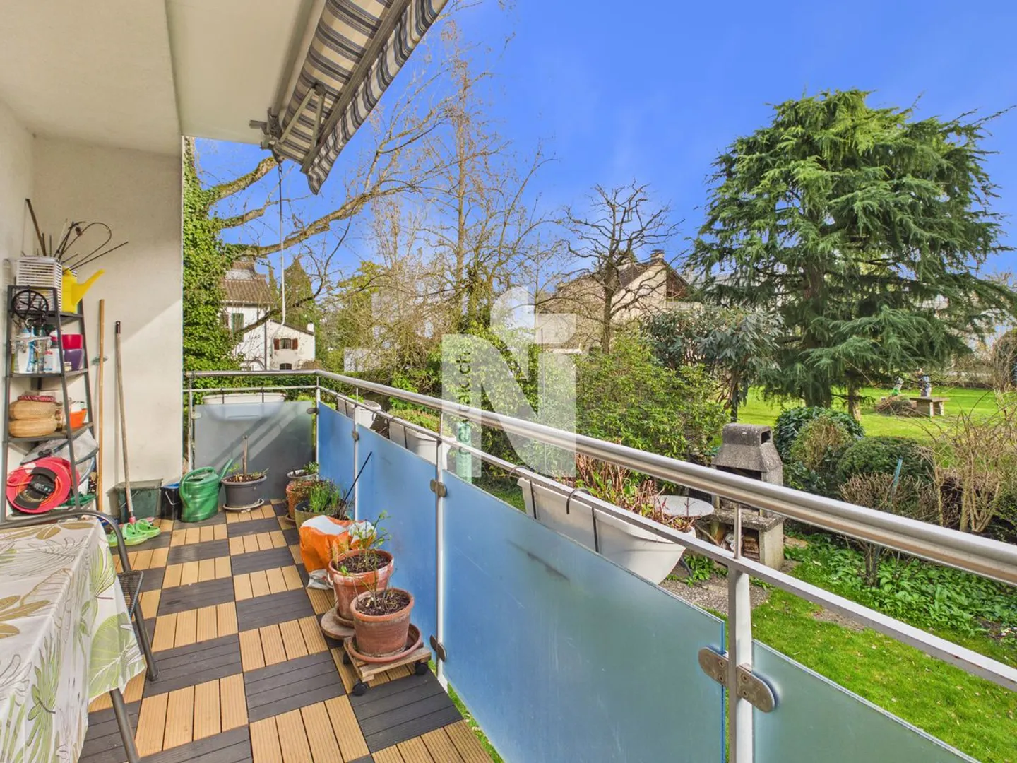 Family-friendly garden apartment with balcony, private garden, garage box, and additional hobby room in the best location on Bruderholz - Photo 5 of 12