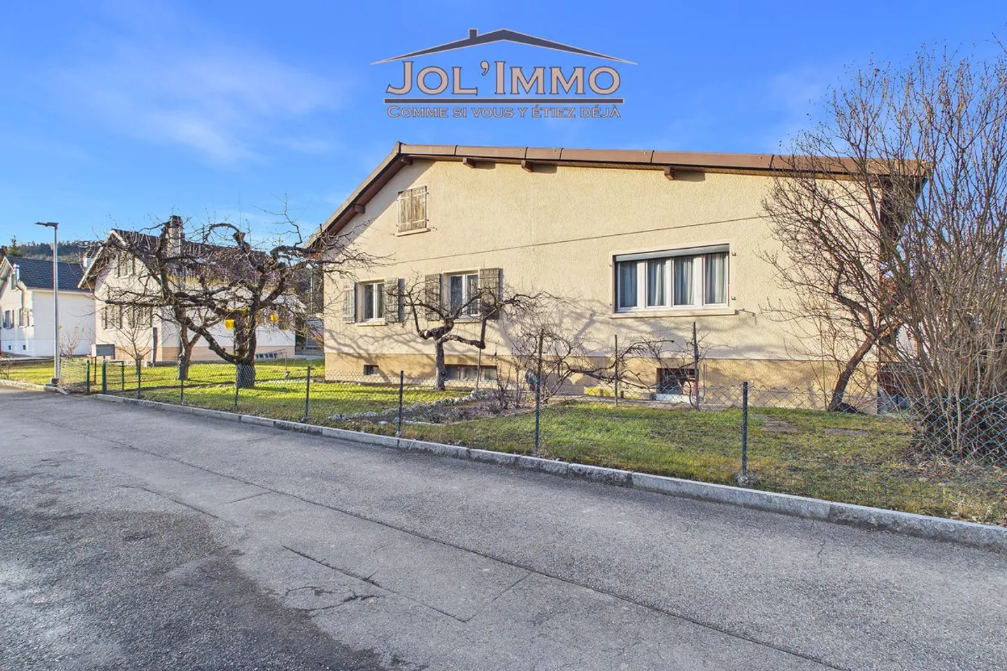Einfamilienhaus mit großem Potenzial in ruhiger Lage in Courrendlin - Foto 1 von 9