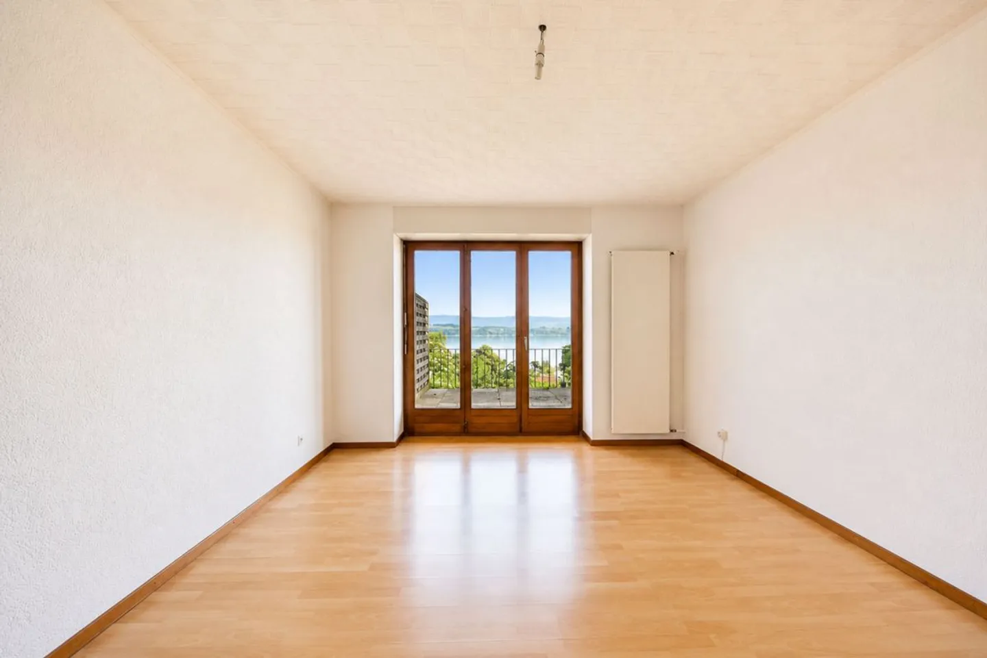 Appartamento di 4.5 locali con terrazza, giardino privato e vista lago - Foto 2 di 10
