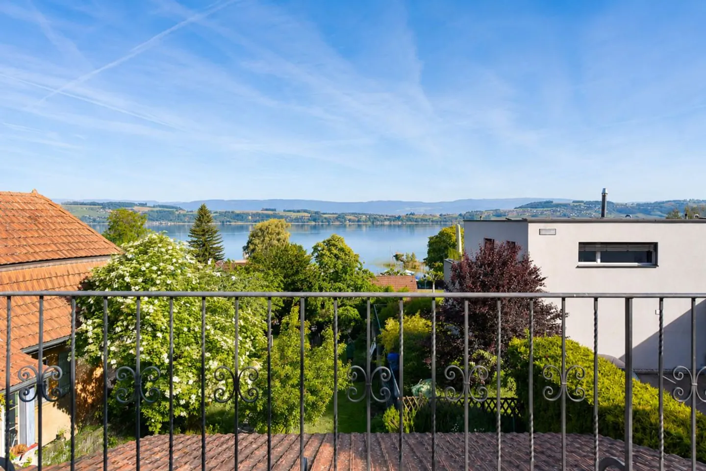 Appartamento di 4.5 locali con terrazza, giardino privato e vista lago - Foto 1 di 10