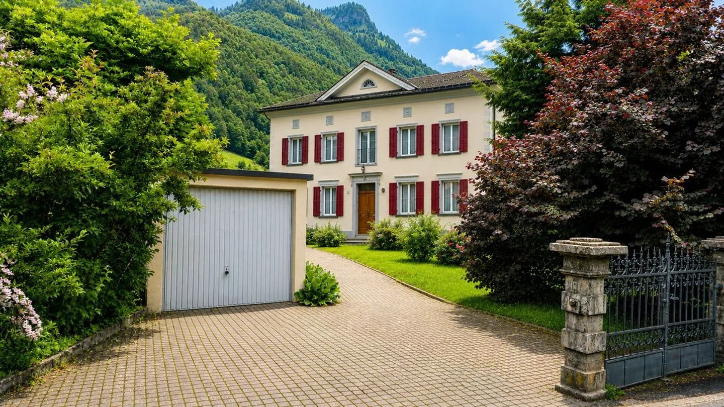 Einfamilienhaus mit grossem Garten - Foto 1 von 9