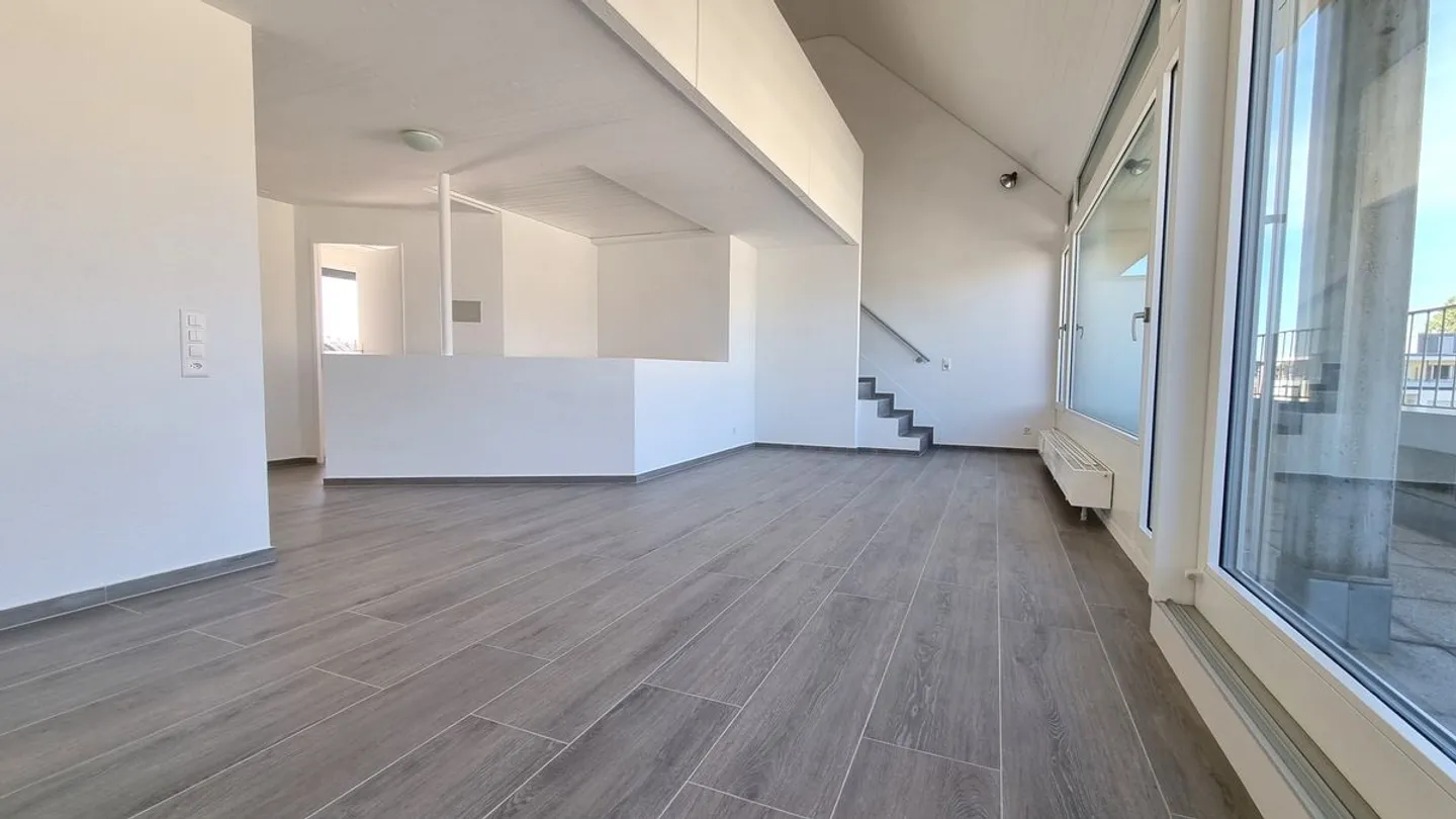 Rare Attic Maisonette with a View in St. Johann - Photo 1 of 13